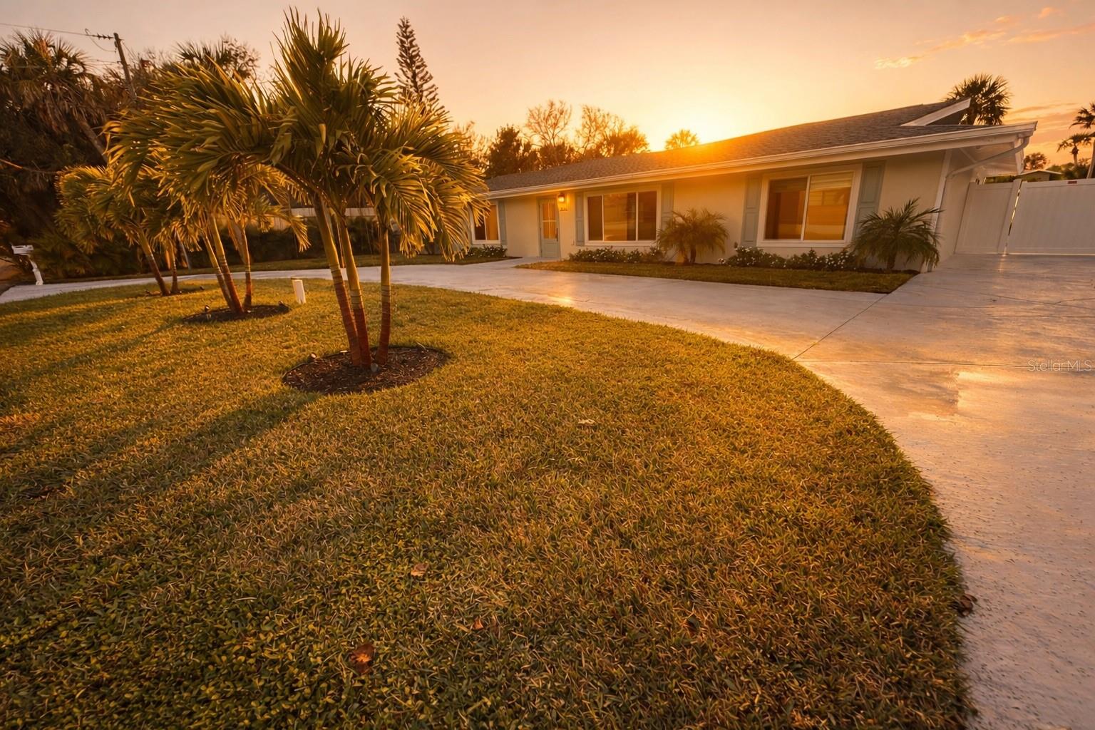 Experience the epitome of luxury with this stunning home that defines coastal elegance. Nestled on a quiet island street, this Florida Coastal masterpiece is set on a large 12,805 square foot lot with 75 ft of private lakefront overlooking the serene waters of Lake Norma, on our famed Siesta Key. 

Renovated with meticulous attention to detail, this newly updated home features an expansive, light-filled open floor plan with continuous quartzite countertops throughout. It includes two primary suites, one of which flows into its own private kitchenette overlooking the tranquil waterfront. Two lanais and a custom built hot tub and pool complete with a waterfall and color-changing lighting system ensure seamless indoor-outdoor living.

Quality and craftsmanship are paramount, and every detail has been thoughtfully considered to ensure superior structural integrity, including the hurricane impact windows and elevated AC condensers. A new roof was installed in 2024, along with new mechanicals, electrical, plumbing, pool surfacing, appliances, and more. This gorgeous island paradise has been fully renovated to both preserve and highlight its architectural elegance. 

A prime location, this property is ideally situated minutes to the world-famous powdery sands of Siesta Key Beach, less than a mile from charming Siesta Key Village, and near the prestigious Out-of-Door Academy. A quick 5-minute drive over the North Bridge takes you to Sarasota proper and a mere 10 minutes more to the heart of dazzling downtown Sarasota and St. Armands Circle, where you can enjoy a wide selection of fine dining, shopping, and world-class cultural arts and nightlife, making it the ideal home for those seeking the ultimate Florida lifestyle. Schedule your private showing today.