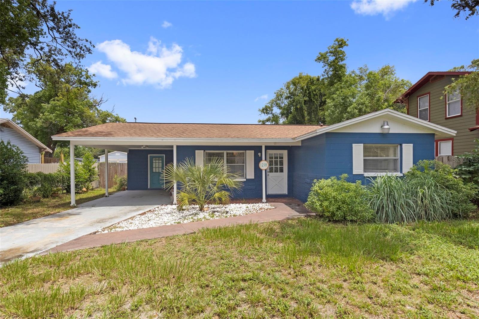 Welcome to 1218 E. New Orleans Avenue, a beautifully renovated 2-bedroom, 1-bathroom home in one of Tampa’s most desirable and centrally located neighborhoods. Renovated from top to bottom, this move-in-ready home blends classic character with stylish updates, creating a space that’s as inviting as it is functional. Step inside to a bright, open floor plan featuring luxury vinyl plank flooring, fresh neutral paint, and updated living spaces designed for everyday living and effortless entertaining. The kitchen serves as the heart of the home, offering quartz countertops, white shaker cabinetry, stainless steel appliances, modern fixtures, and an inviting dining area with French doors leading to the expansive backyard. The remodeled bathroom offers a spa-inspired feel with a frameless glass shower, timeless subway tile, matte black designer fixtures, and a custom vanity — clean and modern, while keeping the warmth buyers are searching for. A dedicated interior laundry room adds everyday convenience, with space for a full-size washer and dryer plus additional storage. Outside, a fully fenced backyard offers plenty of room for pets, entertaining, gardening, or even a future pool, with an open layout that maximizes usable space. A covered carport, block-constructed storage shed, and refreshed landscaping complete the home’s curb appeal. Beyond the cosmetic updates, major systems have been addressed too: a new roof (2021), all-new plumbing (2023), and a new HVAC system (2024) — giving buyers long-term peace of mind along with the style. Conveniently located just minutes from Downtown Tampa, Ybor City, Armature Works, the Riverwalk, major hospitals, shopping, dining, and Tampa International Airport, this home offers the perfect balance of neighborhood charm and city convenience. Whether you’re a first-time homebuyer, relocating, or simply searching for a beautifully updated home in an unbeatable location, 1218 E. New Orleans Avenue is ready to welcome you home.
