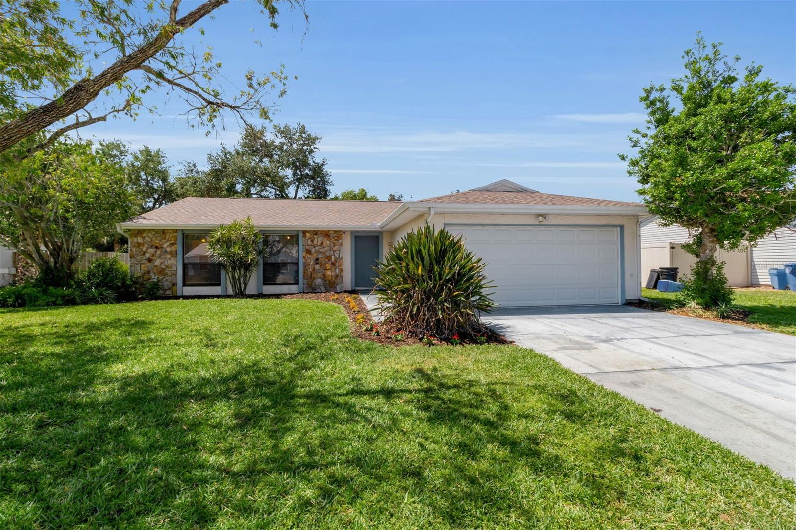 Virtually Staged. Welcome to your slice of Florida living—perfectly positioned just minutes from the world-renowned beaches of Anna Maria Island and Bradenton Beach, yet tucked away in a quiet, convenient neighborhood with no HOA restrictions.

This charming home offers 3 true bedrooms and a bright, open layout enhanced by fresh interior paint and warm, easy-care flooring throughout. The kitchen features ample cabinetry and flows seamlessly into the main living space, making it ideal for both everyday living and entertaining.

Step outside and you’ll find one of the property’s standout features a huge partially fenced backyard. Whether you envision a pool, garden, play space, or outdoor entertaining area, there’s plenty of room to make it your own. Mature trees provide shade and privacy, creating a peaceful outdoor retreat.

Major updates include a brand new roof, offering peace of mind for years to come. The property’s layout and location also present excellent potential for an Airbnb or short-term rental investment making it a versatile opportunity for both homeowners and investors.

Ideally located near IMG Academy, this home is perfect for those seeking proximity to one of the area’s premier sports and education destinations. You’ll also love being close to everything including Publix, shopping, dining, and everyday conveniences while still enjoying quick access to the stunning Gulf Coast beaches.

If you’ve been searching for a move-in ready home with space, flexibility, and an unbeatable location—this one checks all the boxes
One or more photos have been virtually staged.