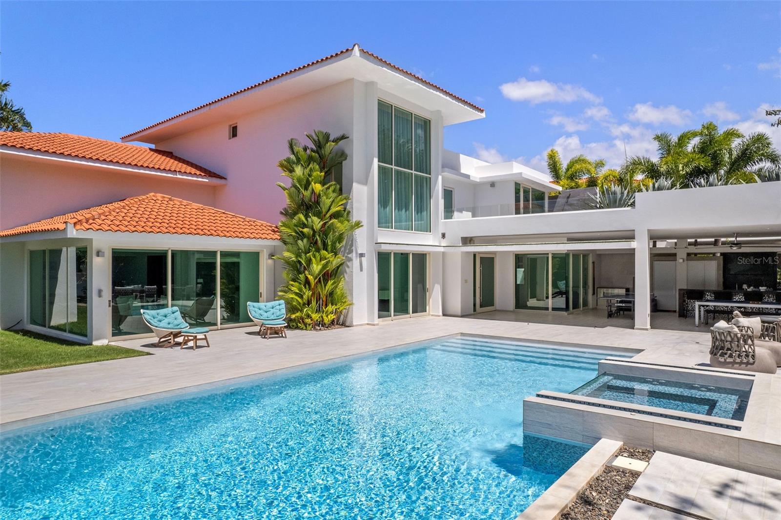 Stunning 6-bedrooms, 10-bathrooms home in Dorado Beach East. Located within the secure confines of Dorado Beach Resort, offering gated access and proximity to golf courses, beach and restaurants. This luxurious property boasts a pool and high-end amenities throughout.
The Dorado Beach East community is private, gated, family friendly and offers a wide range of facilities that you can enjoy. The facilities include scenic pools, clay tennis courts, basketball and beach volleyball courts, a basic gym, a game room, a 3-par golf course that winds through the neighborhood, and an aviation themed park which has a custom water park and sand park.
Located within the Dorado Beach Resort, since it is a 2,000-acre natural reserve most of the communities are 1-3 miles away from the beach and Hotel. This being said, the entire resort is interconnected via golf cart trails, meaning that you can have easy access (walking or in golf cart) to the different communities and amenities within this Resort.