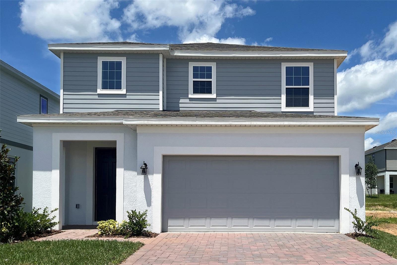 Welcome to Trinity Lakes, a premier master-planned community by Trinity Family Builders located in the scenic surroundings of Groveland, Florida. Designed for modern living, Trinity Lakes blends stylish home designs, resort-inspired amenities, and a highly desirable Central Florida location.
The Gilchrist Plan offers a thoughtfully designed layout featuring 4 spacious bedrooms, 2.5 bathrooms, an upstairs loft, and a covered rear patio ideal for relaxing or entertaining. This home also includes a tandem garage, providing extra space for additional parking, storage, or recreational equipment adding valuable flexibility for today’s lifestyle. Inside, you’ll find elegant quartz countertops throughout and durable tile flooring that combines everyday function with timeless style.
Life at Trinity Lakes extends well beyond your front door, with exceptional community amenities including a resort-style swimming pool with splash pad, clubhouse and fitness center, scenic lakeside dock and pavilion, walking trails, playgrounds, sports fields, and a dog park. With convenient access to the Florida Turnpike, residents enjoy an easy commute to Orlando, nearby shopping, dining, and major attractions.Whether you're looking for comfort, convenience, or a vibrant community Trinity Lakes delivers a lifestyle built for connection, relaxation, and everyday enjoyment.