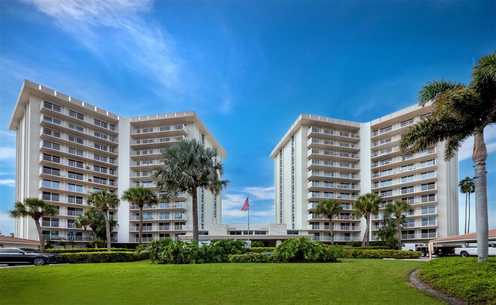 Set directly on the shores of the Gulf of Mexico, this beautifully renovated residence in the Islander Club captures the essence of Longboat Key beachfront living. Located in the desirable South Tower, this 2BR/2BA home showcases a fresh coastal design with wide-plank flooring, crown molding, recessed lighting, and an open layout oriented to the water. The kitchen exudes coastal charm with stone countertops, shaker cabinetry, stainless-steel appliances, and a sea-glass tile backsplash. Both baths have been redone with refined finishes, glass-enclosed showers, and clean modern tilework. Floor-to-ceiling sliders open to an expansive covered terrace—perfect for outdoor dining, lounging, and taking in sweeping Gulf views. The primary suite also enjoys terrace access and an endless horizon of turquoise water. Residents of the Islander Club enjoy 400 feet of private beach, a Gulf-front pool, fitness center, tennis courts, pickleball,  library, social lounge, and on-site management within two secure towers and gated entry. The recently updated common areas - including the elegant lobby and clubroom - offer a stylish, contemporary ambiance overlooking the Gulf. Ideally positioned near St. Armands Circle and Sarasota’s world-class dining, shopping, and cultural attractions, this residence offers an effortless blend of comfort, sophistication, and beachfront tranquility.