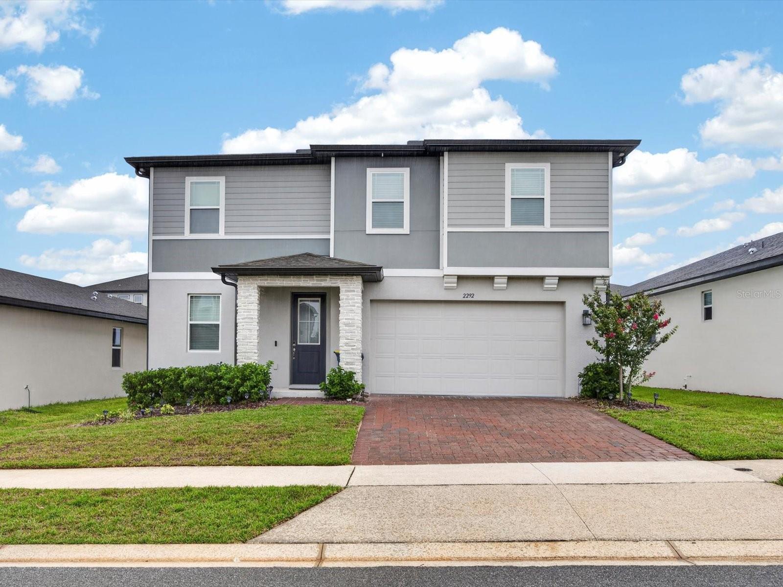 Better than new! This immaculate 4-bedroom, 2.5-bath home, built in 2023, by Meritage Homes ( Florentine floor plan) has been used only as a second home on just four occasions, has never been rented, and truly feels brand new. All four bedrooms are conveniently located upstairs, providing privacy, while the first floor is designedfor comfortable everyday living and entertaining. Featuring over $73,000 in builder and owner upgrades, this home showcases beautiful light, neutral finishes throughout, creating a cozy, and inviting atmosphere filled with abundant natural light. Just off the welcoming hall, you'll find a private office/den, an ideal space for working from home, studying, or managing daily tasks. The room can be enclosed with French doors for added privacy while maintaining an elegantand open feel. The open-concept floor plan includes a spacious great room with a convenient floor outlet and a stunning gourmet kitchen featuring upgraded cabinetry and premium finishes. Upstairs, a spacious loft provides the perfect flex space for a media room, playroom or second living area. Additional upgrades include an extended covered lanai, elegant stone-accent elevation, 8-foot interior doors throughout, beautiful wood staircase with upgraded iron railings, EV charging outlet in the garage, owner-finished painted garage floor, gutters, rear coach lights, laundry room utility sink rough-in, storage space under the stairs, linen closets on both the first and second floors, and a dedicated space for a future mudroom. The home is also pre-wired for a future pool, making it easy to create your dream backyard. Combining thoughtful upgrades, a functional layout, and exceptional condition, this move-in-ready home offers all the advantages of new construction—without the wait. A rare opportunity to own a truly better-than-new home with designer finishes, premium features, abundant natural light, and a versatile floor plan that perfectly suits today's lifestyle.