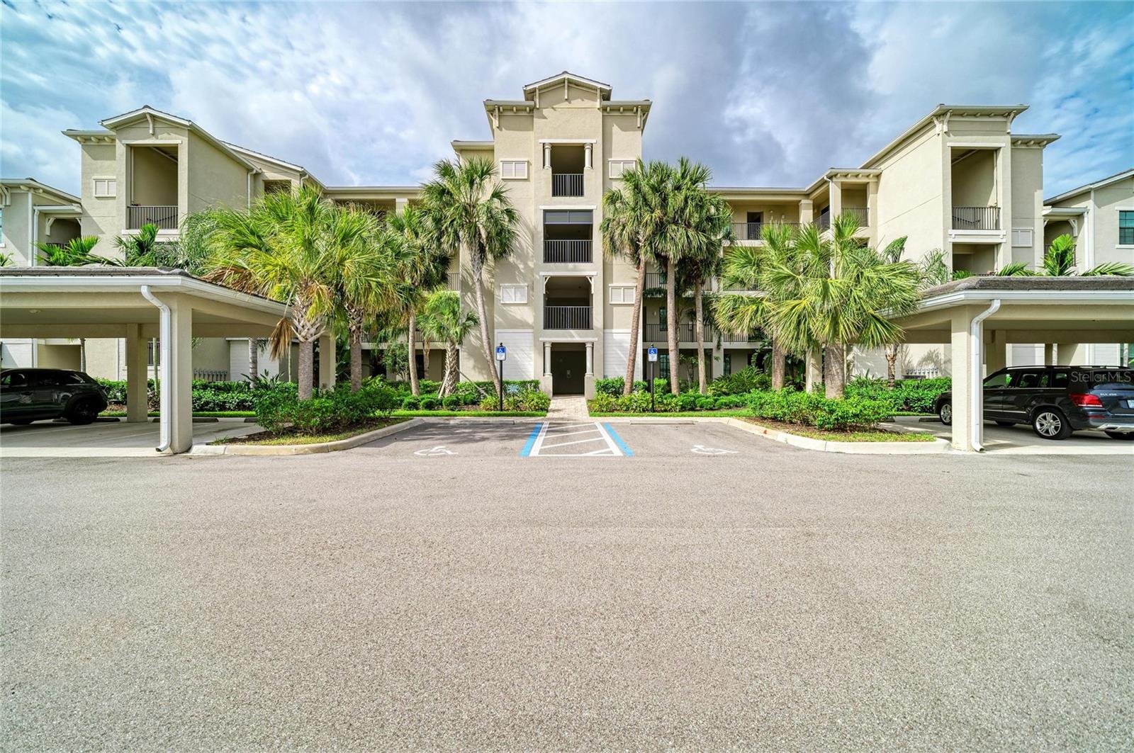 Welcome to Lakewood National Golf Club, one of Florida’s premier golf lifestyle communities. Featuring the sought-after Birkdale floor plan, this top-floor corner condominium showcases the layout buyers love, highlighted by a large kitchen island, white shaker cabinetry, white quartz countertops, all-tile flooring, updated lighting, elegant accent drapery, stylish décor and quality furnishings. Offered furnished and move-in ready, this two-bedroom, two-bath residence combines modern finishes with breathtaking golf course living. The open-concept kitchen and living area flows seamlessly to the south-facing lanai, where sweeping water and golf course views of the sixth hole of the Piper Course create the perfect backdrop for morning coffee, evening cocktails and year-round Florida sunshine. With 1,142 square feet of thoughtfully designed living space, this residence offers comfort, convenience and style in one of Lakewood Ranch’s most sought-after bundled golf communities. Additional features include an assigned covered parking space near the building entrance, an oversized private storage area just outside the front door, elevator access and a satellite pool conveniently located next to the building. Lakewood National Golf Club offers gated, maintenance-free living with exceptional resort-style amenities, including 36 holes of Arnold Palmer-designed championship golf, a zero-entry heated resort pool with a waterfall and lap lanes, a poolside tiki bar and café, a fitness center, a full-service spa, eight lighted Har-Tru tennis courts, pickleball, bocce and six additional satellite pools. The 28,000-square-foot clubhouse features indoor and outdoor dining, private dining rooms, conference and event space, locker rooms, lounge areas and a lively bar for gathering with friends and neighbors. Home to the annual Korn Ferry Tour event, Lakewood National delivers a true country club lifestyle enhanced by a full-time lifestyle director, an active social calendar and endless opportunities for recreation and connection. Widely regarded as one of Southwest Florida's premier bundled golf communities, Lakewood National features the award-winning Commander and Piper courses designed by the Arnold Palmer Design Company. Rolling fairways, strategic bunkering, expansive water features and preserved natural landscapes create a visually stunning golf experience. The Commander Course hosts the annual LECOM Suncoast Classic on the Korn Ferry Tour and helped earn Lakewood National recognition as the 2025 Korn Ferry Tour Host Facility of the Year. Tournament play has been extended through 2030, further solidifying the community's reputation as one of the nation's premier golf destinations. Located within Lakewood Ranch, the nation's top-selling multigenerational master-planned community, residents enjoy convenient access to dining, shopping, arts and entertainment, nature trails, recreation, A-rated schools, Interstate 75, downtown Sarasota, downtown Bradenton, Tampa and world-renowned Gulf Coast beaches. There is no better location than Lakewood Ranch and no better golf lifestyle than Lakewood National Golf Club.