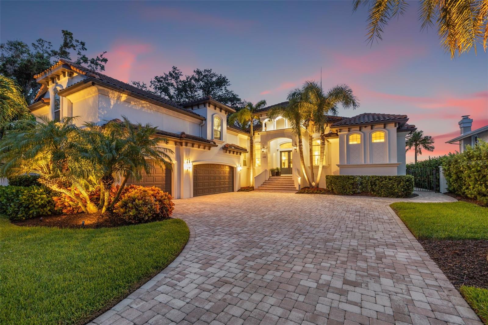 PRICE REDUCED! Luxury Waterfront Retreat on Coffee Pot Bayou | Snell Isle
Experience refined Florida waterfront living in this custom-built 2016 residence, ideally situated on the tranquil waters of Coffee Pot Bayou in the highly coveted Snell Isle community. Constructed with solid block and stucco, a slab foundation, and a classic barrel tile roof, this home seamlessly blends timeless architecture with modern sophistication.Offering 4,560 square feet with 5 bedrooms and 6 bathrooms, the interior features soaring 10+ foot ceilings, hurricane-impact windows and doors, and a whole-home smart system integrating lighting, sound, and video. Nearly every room is designed to capture serene waterfront views, filling the home with natural light.
A standout feature is the main-floor primary suite, providing the ease of single-level living with peaceful bayou views, and refined finishes. 
Perfect for entertaining, the chef’s kitchen is equipped with premium Wolf appliances, a new Sub-Zero refrigerator, Miele dishwasher, custom
Upstairs, a spacious bonus room offers exceptional flexibility as a media lounge, entertainment space, or additional bedroom, complete with cabinetry, a water purification system, and an expansive island with seating and built-in bar. Wine enthusiasts will appreciate three wine refrigerators and the classic parlor bar area.   a walk-in closet—perfect for guests, teens, or a private retreat. A waterfront guest suite with a private bath on the main level further enhances the home’s thoughtful layout.
Outdoor living is designed for year-round enjoyment with a heated saltwater pool (2021), expansive covered patio with motorized screens, outdoor gas grill, and fireplace. The updated seawall meets current standards.  Boat lift with floating dock for launching kayakes and paddle-boards.. 
Additional features include a whole-home generator, 3-zone HVAC, dual instant-hot gas water heaters, recent exterior paint (2022), and tenting completed in 2025. This exceptional waterfront property delivers luxury, comfort, and an unmatched Snell Isle lifestyle.
