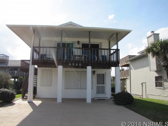 A unique beachside home on the west side of S Atlantic  includes 25' lot on the ocean. The house extends from S. Atlantic to Turtlemound Rd. Huge garage with room for a motor home. Lots of decking. Two bedrooms down with family room and bath. One bedroom upstairs with bath, kitchen, dining and living room. View of the ocean from the east balcony and rooftop deck. Rock revetment on oceanfront lot included and no driving on the beach area. Close to Canaveral Seashore. Walk to the river. ;Water: City
