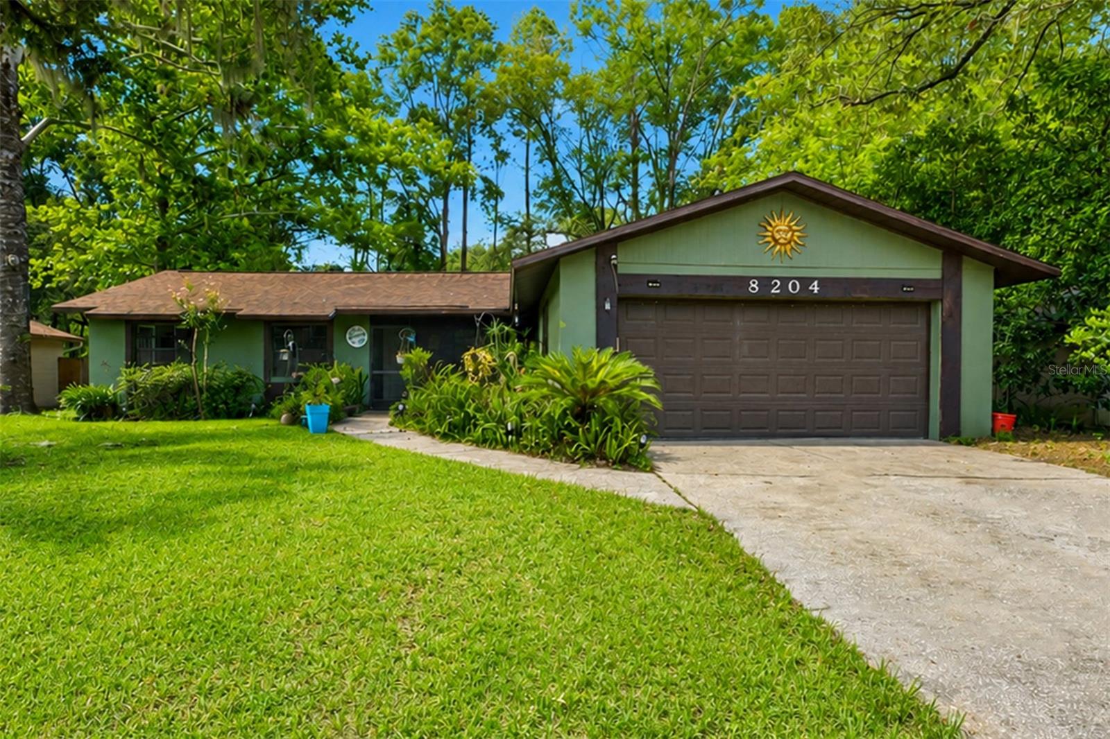 Welcome to Westwood, a quiet neighborhood in the heart of Gainesville’s bustling southwest area with convenient access to shopping, dining, entertainment, I-75, Santa Fe College, North Florida Regional Medical Center, Oak Hall School and more!  This 4 bedroom, 2 bath home features a cozy great room with corner, wood burning fireplace and a large Florida room with a beautiful view of the private, fenced back yard with deck and fire pit. All flooring is vinyl plank and tile, no carpet.  This home comes fully equipped with all appliances included: oven/range, refrigerator, dishwasher, clothes washer, clothes dryer and an extra refrigerator in the garage.  The lot backs to a greenway / easement area so there are no close neighbors directly behind. No HOA.