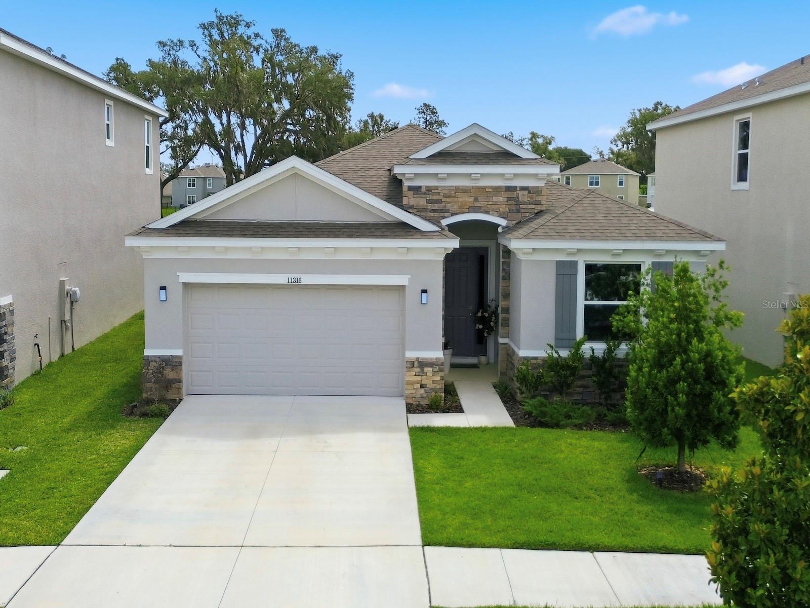 Welcome to resort-style living in the highly sought-after Mirada Lagoon community! This beautifully maintained 4-bedroom, 2.5-bath SMART home showcases the perfect blend of comfort, effortless entertaining, and scenic views. The spacious open-concept floor plan features a stunning kitchen with quartz countertops, abundant cabinetry and a large island overlooking the living and dining areas-ideal for entertaining and everyday living. Enjoy peaceful pond views from the extended screened-in porch, providing the perfect space to relax and unwind year-round. The thoughtfully designed layout includes generously sized bedrooms, multiple living spaces and ample room for entertaining. Located in one of the area's premier ULTRAFi communities which includes internet and cable, residents enjoy access to Mirada's famous 15-acre crystal lagoon, along with exceptional amenities and a vibrant lifestyle. Don't miss this opportunity to own a piece of paradise in Mirada!