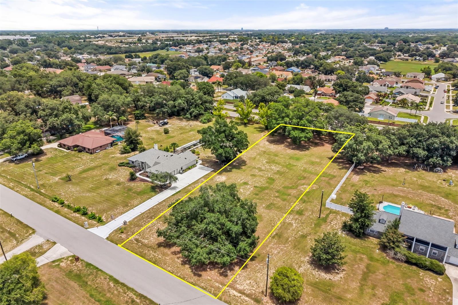 This 1.08 acre lot inside of  the quaint community of Blue Ridge Acres is all cleared and ready for you to build your dream home. It is zoned R-CE which allows  for Single-family detached dwellings, agricultural activities, and keeping of horses, cows, or chickens (often with limits on the number of animals). If you'd like to have more land and already have a home that's ready and beautiful, you can also purchase the home next door at 6231 Albeth Rd This way you can have a little over two acres to work with. This is also an excellent location that is close to SR 414 that stretches from Apopka to Maitland with a connection to I-4.