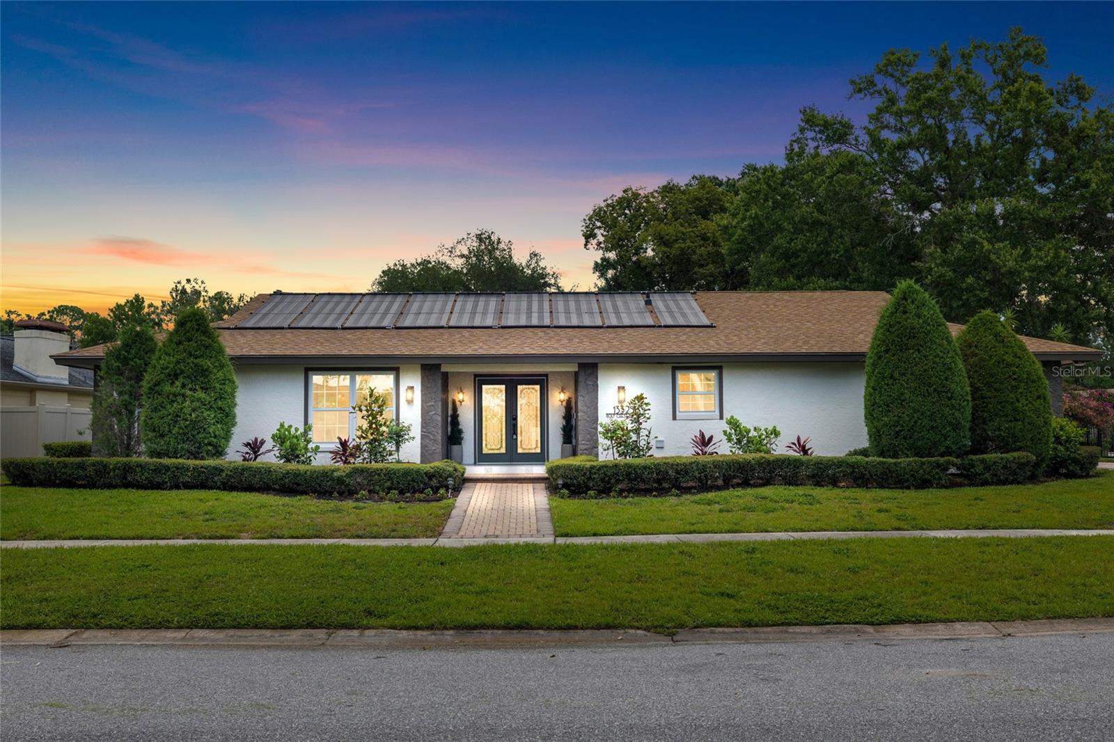 Welcome to this wonderful 4 bedroom PLUS office, 4 full bath, 2 car garage pool home in the heart of Carrollwood PHASE 1! Its been tastefully reimaged inside with no expense spared. The open floor plan is perfect for entertaining, and the split bedroom set up leaves an office and guest bedroom with ensuite bath and pool access in the front of the home, while the primary, and two other bedrooms and pool bath are to the rear. The heart and soul of this home is the kitchen which features solid wood soft close cabinetry, luxury quartz stone (and throughout the entire home!), stainless steel appliances, and a massive island! To the other end of the home is a fully built in TV wall with all the storage you could ask for and an entire wall to hang a massive TV! And for those winter months, there is a wood burning fireplace right in the middle of the home! The fully water proof luxury vinyl plank flows seamlessly throughout and has a 22mil wear layer, close to double what is found in big box stores. The home additionally features a fully pavered driveway big enough to fit 6 cars, full irrigation front and back, full outdoor kitchen with grill and exhaust, as well as a solar spa heater for the pool. AC is 2018, and 2026, water heater is 2018, and roof is 2013 so you're free to move in with peace of mind for many many years so come. Carrollwood is close to great schools, beaches, airports, downtown Tampa and all of its amenities and so much more. Not in a flood zone. This is the home you've been waiting for!