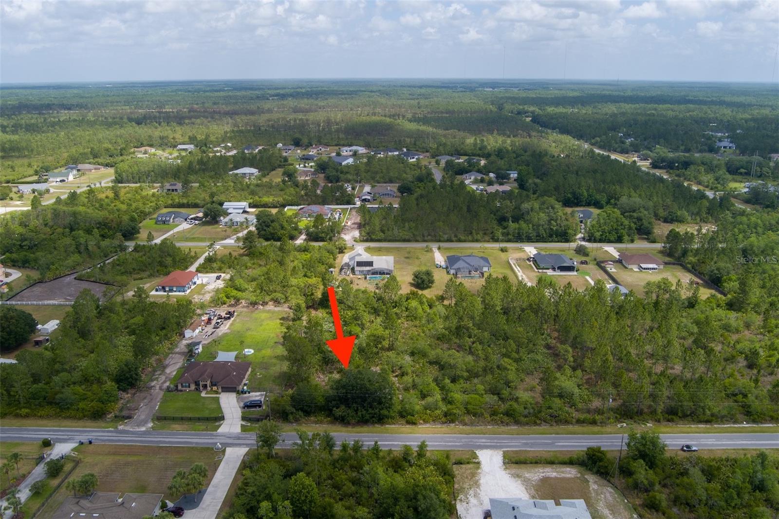 This buildable 1.03 acre vacant parcel of land is in Wedgefield community. This property is not in a flood zone, and is partial wetlands in back NE corner of property. CAD report that shows partial wetlands is available upon request. Electricity is nearby. Well and septic are needed. You can built a traditional site built home on the land.

Wedgefield is known for golf and equestrian living, wide-open homesites, and peaceful natural surroundings. The community features a large playground, outdoor workout gym, multiple ball courts including pickleball, a dog park, and an 18-hole golf course with clubhouse and restaurant. You’ll also enjoy immediate access to the 9,515-acre Hal Scott Regional Preserve, offering miles of trails for hiking, horseback riding, bicycling, wildlife viewing, and fishing.

Property has quick access to SR 528, 417, 408, Hwy 520, Lake Nona Medical City, Orlando International Airport, Downtown Orlando, and the Space Coast beaches.

No HOA, freedom to bring your own builder, the community’s top-rated schools, and quiet country feel make Wedgefield such a unique neighborhood in Central Florida. Your Florida acreage lifestyle starts here, secure this premium homesite today.