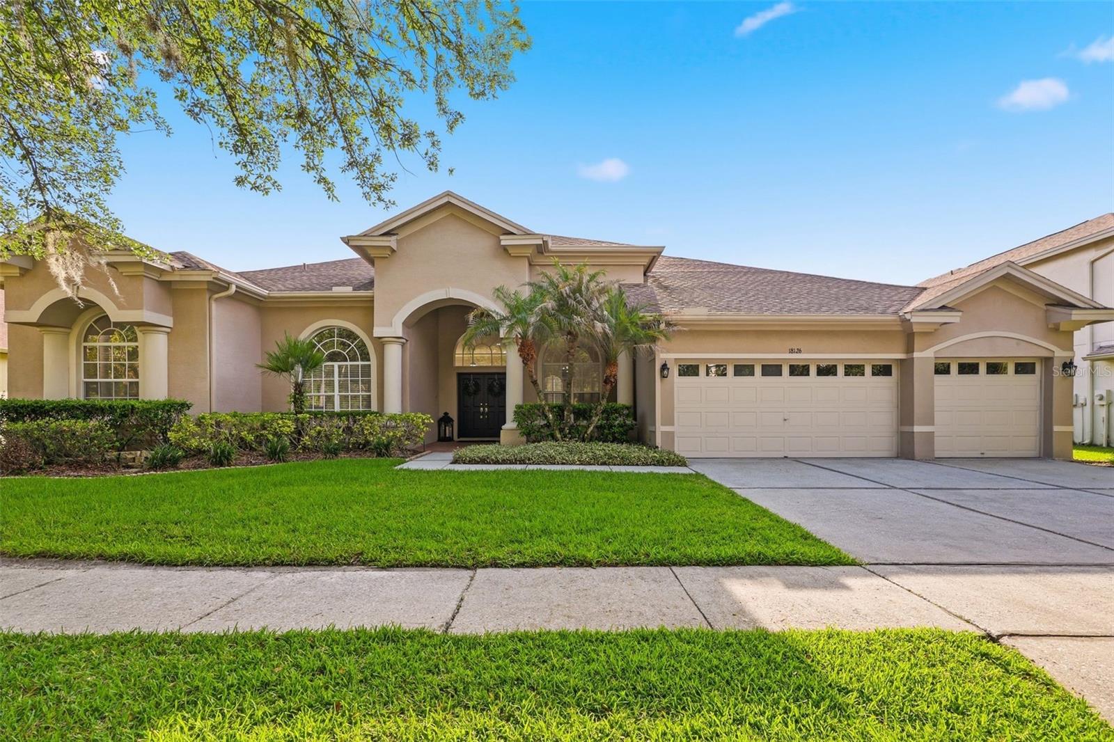 GOLF COURSE COMMUNITY LIVING AT ITS FINEST! Stunning executive home located in the Heritage Isles Community in the New Tampa area.  Newly remodeled 3,706 sq ft, 4 bedrooms, 3 bathrooms, 3 car garage, formal living and dining rooms, family room, office/den, sparking pool and all of this overlooking the fantastic big private backyard.  Home boasts new Waterproof Luxury Vinyl Plank Flooring throughout living areas, Office and master bedroom, new carpet in additional bedrooms. Fantastic Big Kitchen with large bar island with new quartz counter tops and backsplash, all new stainless steel appliances and eat in kitchen nook. This home is an entertainer's delight!  Primary Bedroom is very spacious and inviting with a fully remodeled glamorous primary bathroom with walk in shower, soaking tub, new cabinetry and quartz countertops & large walk in closet.  Floor plan is open, spacious open & bright with new lighting, new blinds,  fans and newly painted interior.  You will love the outdoor living space with the fantastic pool and views! Additional features are new quartz countertops in the big laundry roomed that’s plumbed for a second refrigerator.  Enjoy resort-style community amenities, including a pool with water slide, kiddie pool, basketball and volleyball courts, and a fitness center—all included in a low HOA fee. Just minutes from shopping, restaurants interstates I75, 275, I4, downtown Tampa, Orlando and much more.  Make your Appointment today!
