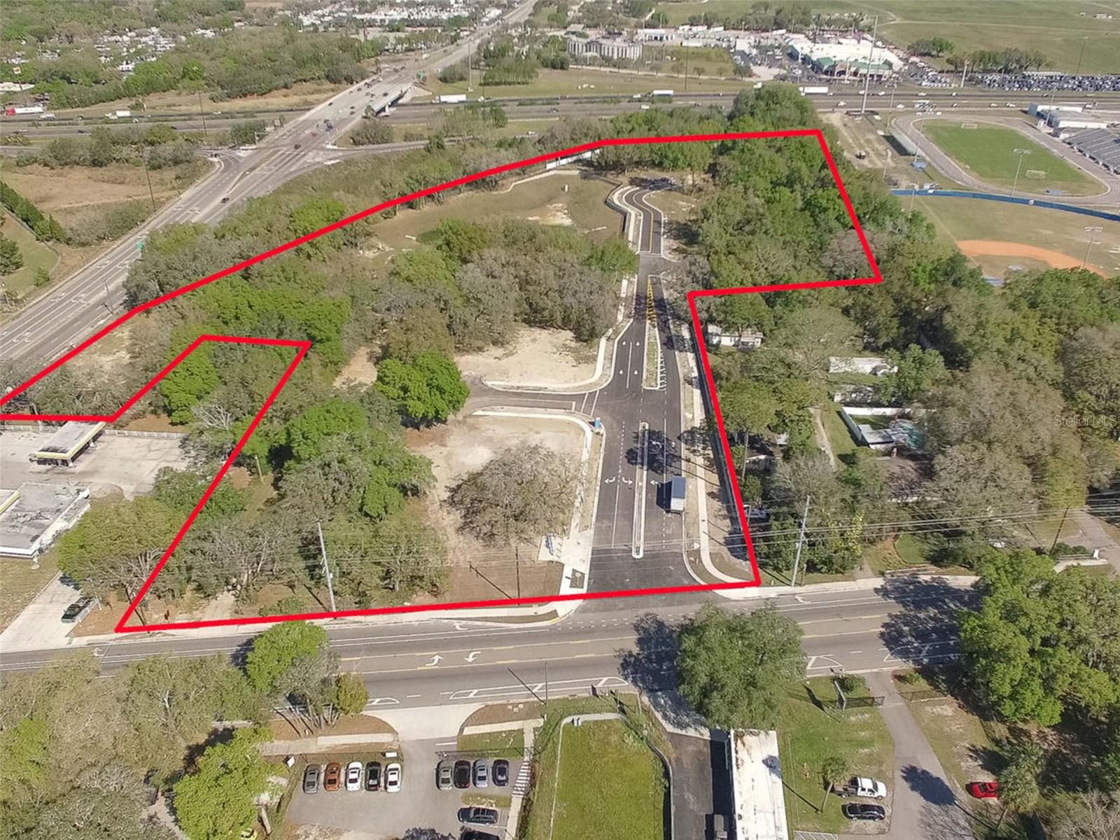 Under Construction. Mango Pointe Commercial Subdivision - 10 Individual sites for sale 36 to 2.58 acre sites.  Approved (PD) Planned Development allows for Hotel, Retail, Restaurant and Office for 87,650 sqft. SE corner Interstate 4/CR 579, High visibility on Interstate 4. Access from Mango Road (CR 579) and the main grand entrance U.S. Highway 92. Access to county water and sewer. Master retention and commercial community.  Area of heavy growth along I-4 corridor of residential and commercial. Last remaining undeveloped site on intersection. PD updated in 2015. Adjacent to Armwood High School, across from Lazydays RV, Country Inn & Suites, Cracker Barrel, Wendy's, Bob Evans Restaurant, Hampton Inn, Gator Ford, Rooms to Go, minutes from I-75 and Hard Rock Casino, State Fair grounds, minutes from Tampa International Airport and downtown Tampa.