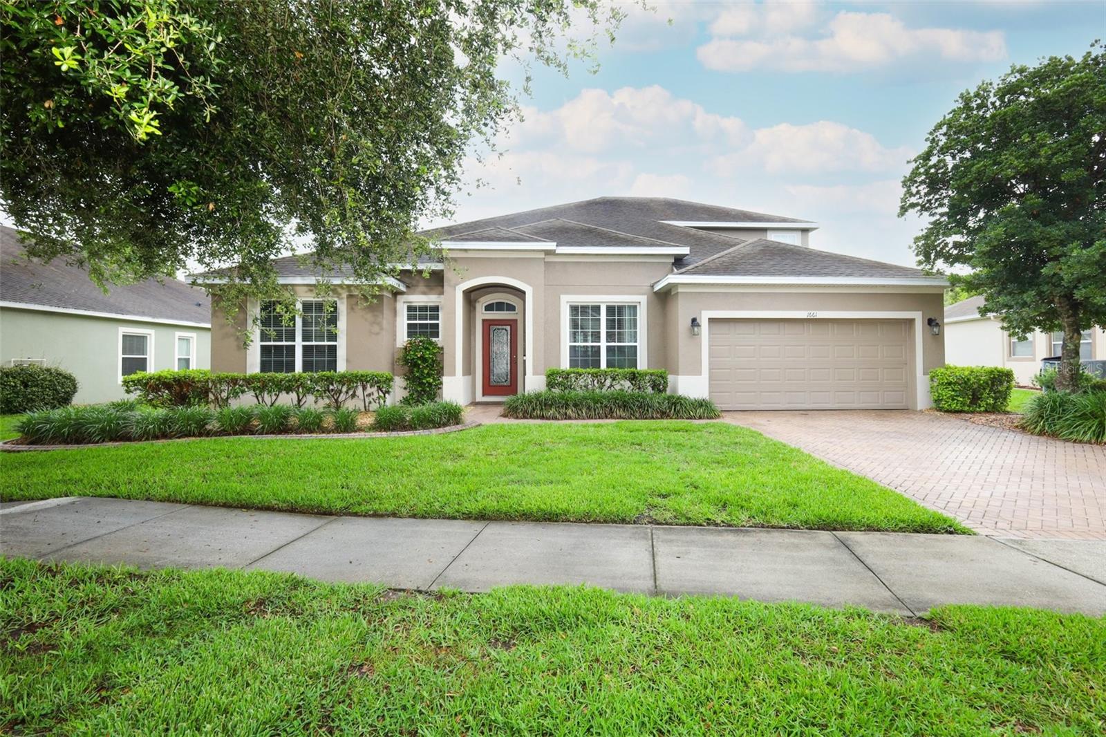 A rare find beautifully upgraded 2013 home in Saddlebrook community. This move-in ready home has 5 bedrooms and 3.5 baths it all starts with a gorgeous circular foyer as you enter with a dining room on the right. Crown moulding in all main areas. All rooms have tile or Bamboo wood floors no carpet. To your left is first bedroom with a hall tub bath. Further to your left is a second bedroom with French Doors entrance with 2 separate closets. To your right the Kitchen opens up to a dinette and living room and features granite counters, a walk in pantry, 42
inch cabinets with crown molding, stainless appliances, built-in wine fridge plus a large island. To the left of the living room are two more bedrooms with a Jack &Jill bath between. Oversized Master bedroom is tucked away on the right side of the house with a built-in electric fireplace for relaxation. Master bath is truly perfect with double vanities, shower, garden tub, linen closet and water closet plus a huge walk-in closet. Loft is up the stairs and could be used as a 6th bedroom with a closet and a half bath plus a projector with screen for those cozy movie nights! Inside laundry room with sink leads to every man’s dream 3-car tandem garage which you’ll have to see to believe! Exterior painted 2026. Back covered patio is excellent for outdoor living with a built-in Weber propane grill, Hot Springs Spa, and a bar plus a wooden deck, pond view, whole house Generac generator, whole outside house monitored by 8 cameras, and water softener. Saddlebrook Community has a playground and a pool for all those fun summer days. Located right in between the entertainment of Orlando and the relaxation of the beautiful Florida beaches.