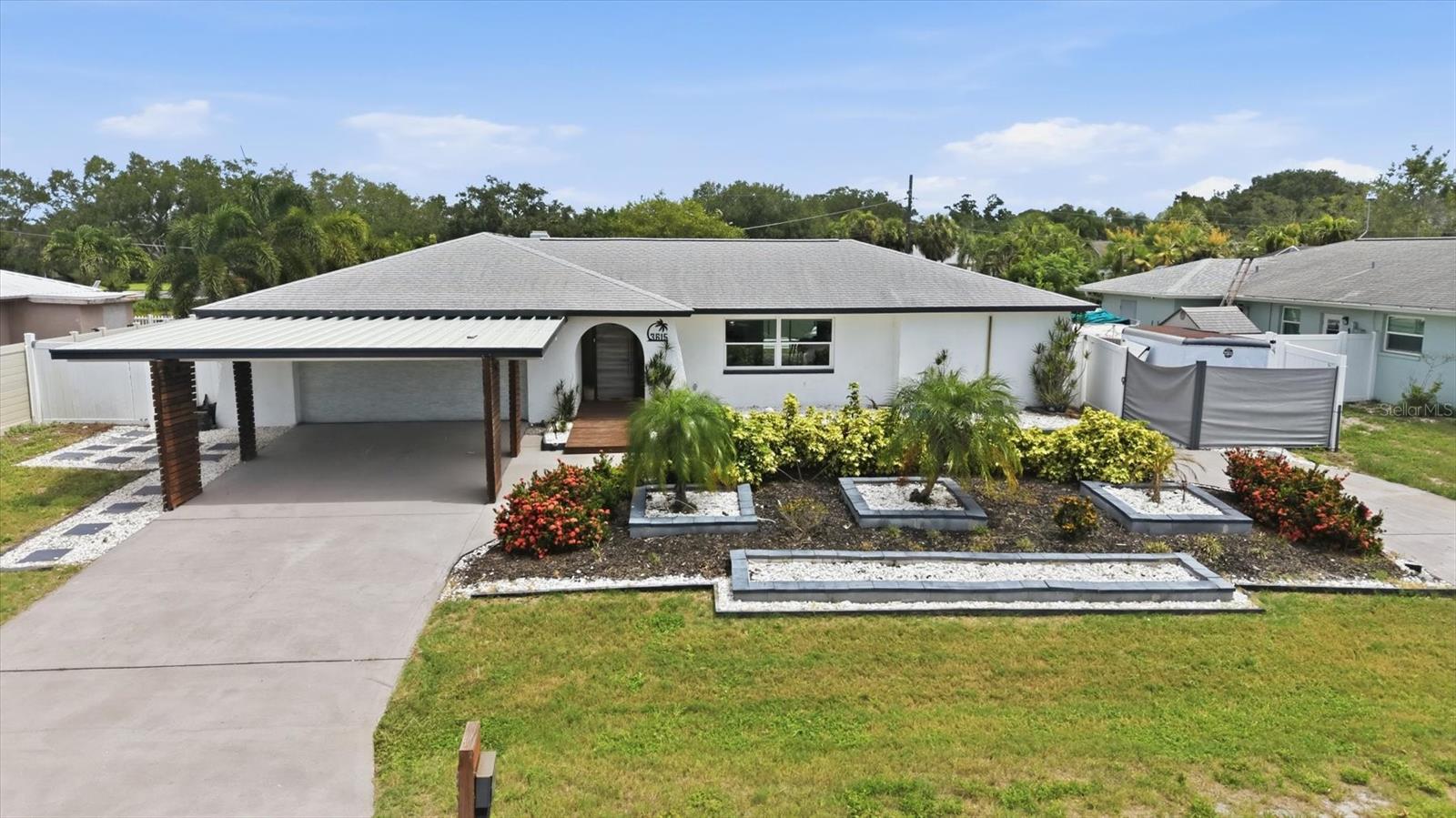 Completely remodeled pool home with water views tucked along a quiet cul-de-sac in Sarasota's established Beneva Park neighborhood, 3615 Egerton Cir delivers the easy, laid-back coastal lifestyle buyers dream about. This move-in ready, turnkey gem boasts water views that create a serene backdrop for daily living. An inviting open floor plan showcases rich hardwood floors, abundant natural light, and a cozy fireplace serving as a warm centerpiece for quiet evenings. The updated kitchen serves as the heart of the home, featuring modern stainless steel appliances, sleek countertops, and a functional pantry that makes daily cooking and effortless entertaining a joy. A large lanai overlooks an inviting pool with a beach-inspired setting, perfect for relaxing near the water.

Privacy defines the thoughtful split floor plan layout. Inside the master suite, buyers will discover a spa-like retreat with scenic water views and a spacious walk-in closet, offering a true private escape. Off the main hall, a dedicated laundry room provides everyday convenience, while the converted garage creates a climate-controlled flex space perfect for a home gym, media room, or private studio, with additional room for a garage or extra storage nearby. Step through the glass doors to experience unmatched resort-style outdoor living. Featuring a custom pool designed for ultimate relaxation, the backyard oasis is fully fenced and bathed in sunshine. Unwind on the covered patio, soak up the sun, or host unforgettable weekend gatherings beside the resort-style pool, all surrounded by mature tropical landscaping and stunning views across the water.

Free from HOA restrictions, this property offers complete freedom to store a boat, RV, or trailer right on site. Situated close to Sarasota Bay and near Gulf Gate Village, the location puts everything within reach. Residents are just minutes from Siesta Key Beach, Sarasota Square Mall, and Ashton Elementary. Commuting is seamless with quick access to Beneva Road, Proctor Road, and Interstate 75. Spend your weekends exploring the nearby Legacy Trail or taking a quick drive to the vibrant energy of Downtown Sarasota, just minutes away. Combining scenic water views, a private resort-style pool, an updated kitchen, and high-end finishes throughout, this move-in ready coastal retreat with hardwood floors, a fenced yard, and a cozy fireplace is ready for immediate enjoyment.