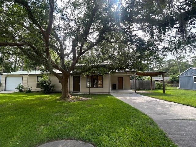 Welcome to 4610 NW 27th Terrace in Springtree!  NO HOA. This well-equipped home combines comfortable living with practical upgrades. Features include a durable metal roof installed in 2007, a newer gas range and vent hood, Cat6 Ethernet wiring, a sprinkler system, and a fenced backyard with plenty of usable outdoor space. A whole-home generator connection allows a compatible portable generator to power the home and central air-conditioning system, subject to generator capacity and proper operation. Parking and storage are abundant with a garage, and a double carport, and two backyard storage sheds. The garage is finished with a heavy-duty epoxy-coated floor for added durability and easy maintenance. Conveniently located in the Springtree neighborhood near local shopping, dining, services, and major routes. Schedule your showing and explore everything this property has !