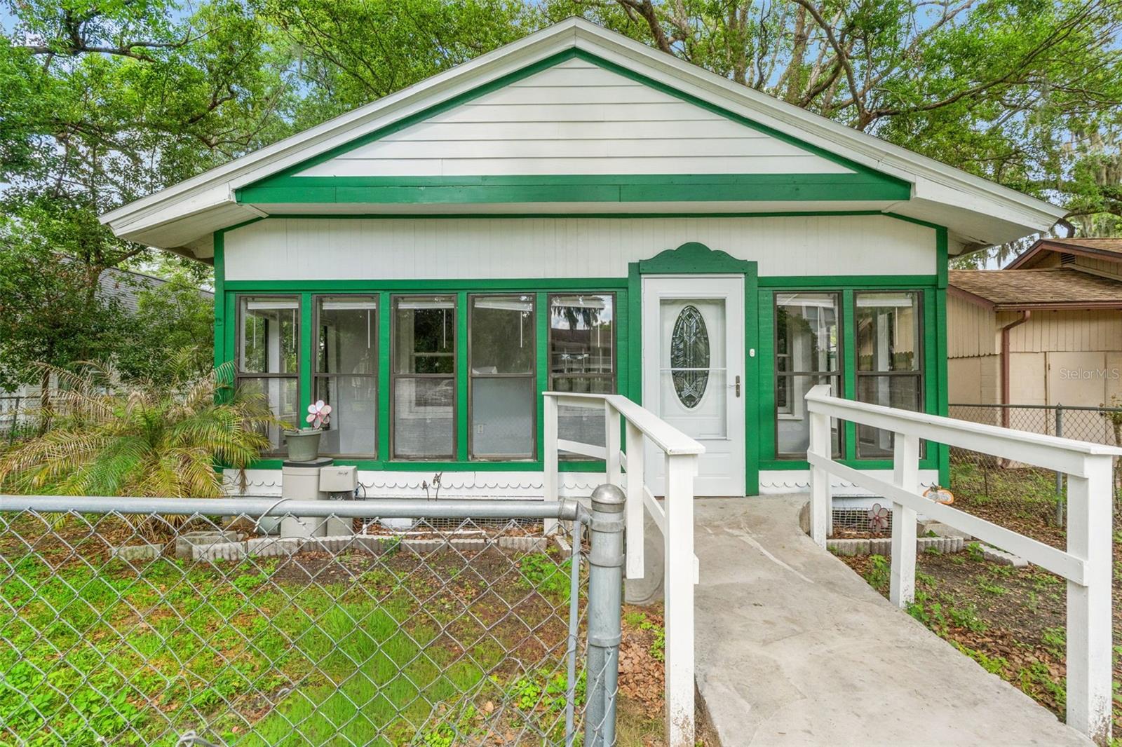 Discover 5518 11th St, Zephyrhills, a beautifully maintained 1-bedroom, 1-bathroom
home offering the perfect combination of modern upgrades, comfort, and freedom. Second bedroom was removed.
This move-in-ready property provides incredible value with major infrastructure already taken
care of, featuring a newer HVAC system (2023), updated windows (2020), and a
whole-house water purification system for ultimate peace of mind. Step inside to find a
bright and inviting living space anchored by a beautifully updated fireplace and chimney
(2025), perfect for cozy evenings. The interior features durable, seamless laminate
flooring and tile throughout—completely carpet-free! The updated kitchen is a standout,
boasting stone countertops and ample prep space, making cooking and entertaining a
breeze. Adjacent to the kitchen, a charming dining area completes the heart of the
home, while the fully updated bathroom adds a sleek, modern touch .Extend your living
space into the wonderful enclosed sunroom, a versatile space bathed in natural light
that is perfect for a home office, reading nook, or morning coffee spot.The outdoor
space is a true private retreat. Step out onto the rear deck made for lounging and
overlooking the expansive backyard, which offers plenty of room for gardening, outdoor
activities, or entertaining guests. The yard also features a large storage shed that has
been upgraded with electrical power, making it an ideal workshop, hobby space, or
man-cave/she-shed. With no HOA or CDD fees, you have total flexibility to park your
toys and live without restrictive rules. Located just minutes from local shopping, dining,
and everything Zephyrhills has to offer, this updated gem is ready for its next owner.
Schedule your showing today!