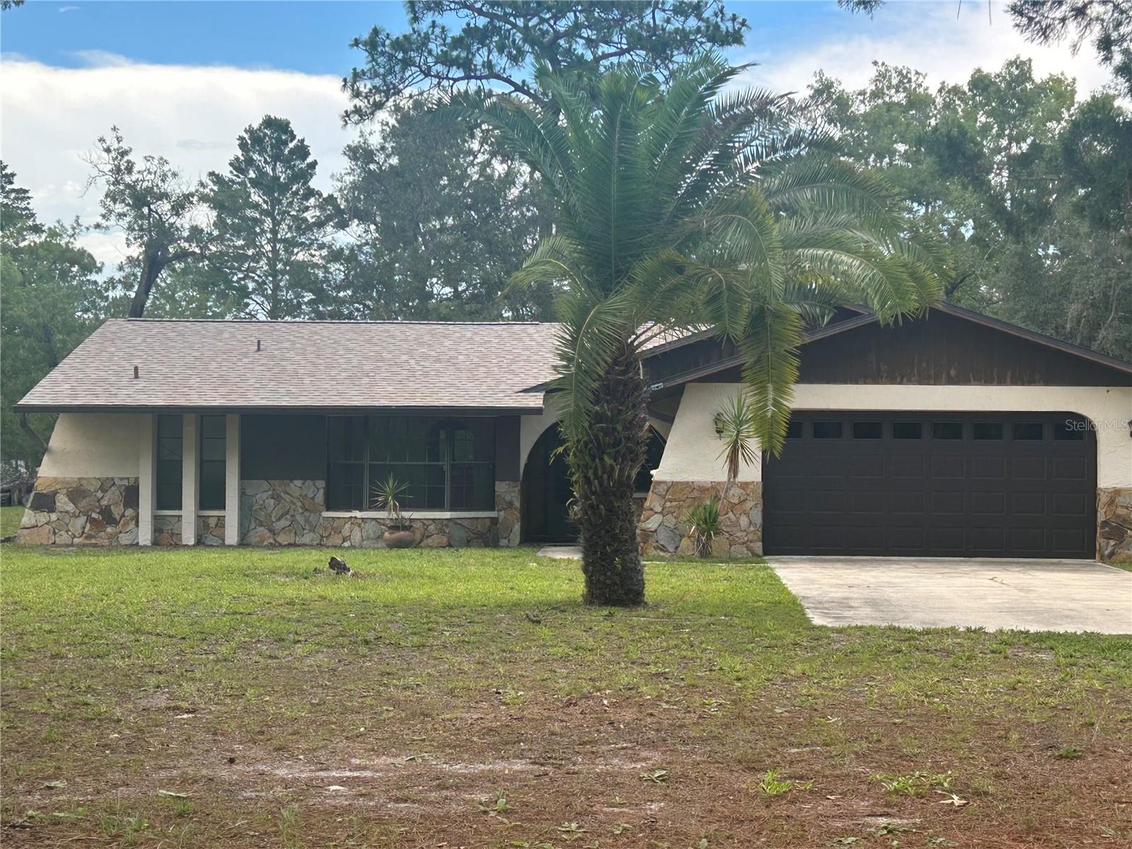 Under contract-accepting backup offers. 4.62 ACRES • MULTIPLE OUTBUILDINGS • ROOM TO DREAM BIG!
Professional photos coming soon! Finding nearly 5 acres with this much flexibility is becoming harder and harder. This property is packed with potential. Whether you've been searching for space to store your toys, start a hobby farm, run a business from home, or simply enjoy room to spread out, this property delivers.
The home offers 3 bedrooms, 2 bathrooms, and a 2-car attached garage, along with a cozy wood-burning fireplace, fresh interior paint, gutters, four new double-pane windows, and a brand-new double-pane sliding glass door. Outside is where this property really shines. In addition to the attached garage, you'll find a massive detached garage/workshop, a second detached garage, a carport, and a storage shed—giving you space for vehicles, equipment, RVs, boats, hobbies, or your next big project.
Bring your vision, your tools, and your imagination because properties with this much land, this many outbuildings, and this much potential don't come along every day. ROOF 2024, AC 2017