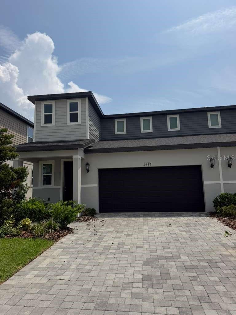 Welcome to Cyrene at Minneola — one of Minneola's most sought-after new communities by Meritage Homes! This stunning brand-new townhome has never been lived in and is move-in ready, offering the perfect blend of modern design and everyday comfort.

Featuring 4 spacious bedrooms, 2 full bathrooms, a convenient powder room, and a generous loft — ideal for a home office, media room, or playroom — this home truly has it all. The open-concept main floor boasts a designer kitchen with a large island, walk-in pantry, ENERGY STAR® appliances, and smart home technology, flowing seamlessly into the dining and living areas.
Built with spray-foam insulation and advanced energy-efficient systems, this home keeps utility bills low all year long. Enjoy a 2-car attached garage, private patio, and access to resort-style community amenities including a sparkling pool, cabana, dog park, walking trails, and tot lot.
Perfectly located with quick access to Florida's Turnpike, Publix at Hills Crossing, Downtown Clermont, restaurants, and retail. For school information, please visit the Lake County School District website.
Don't miss this rare opportunity to lease a never-lived-in Meritage home in one of Lake County's fastest-growing communities. Schedule your showing today!
*Some photos have been virtually staged. The furniture and décor shown are for illustrative purposes only and are not included in the rental