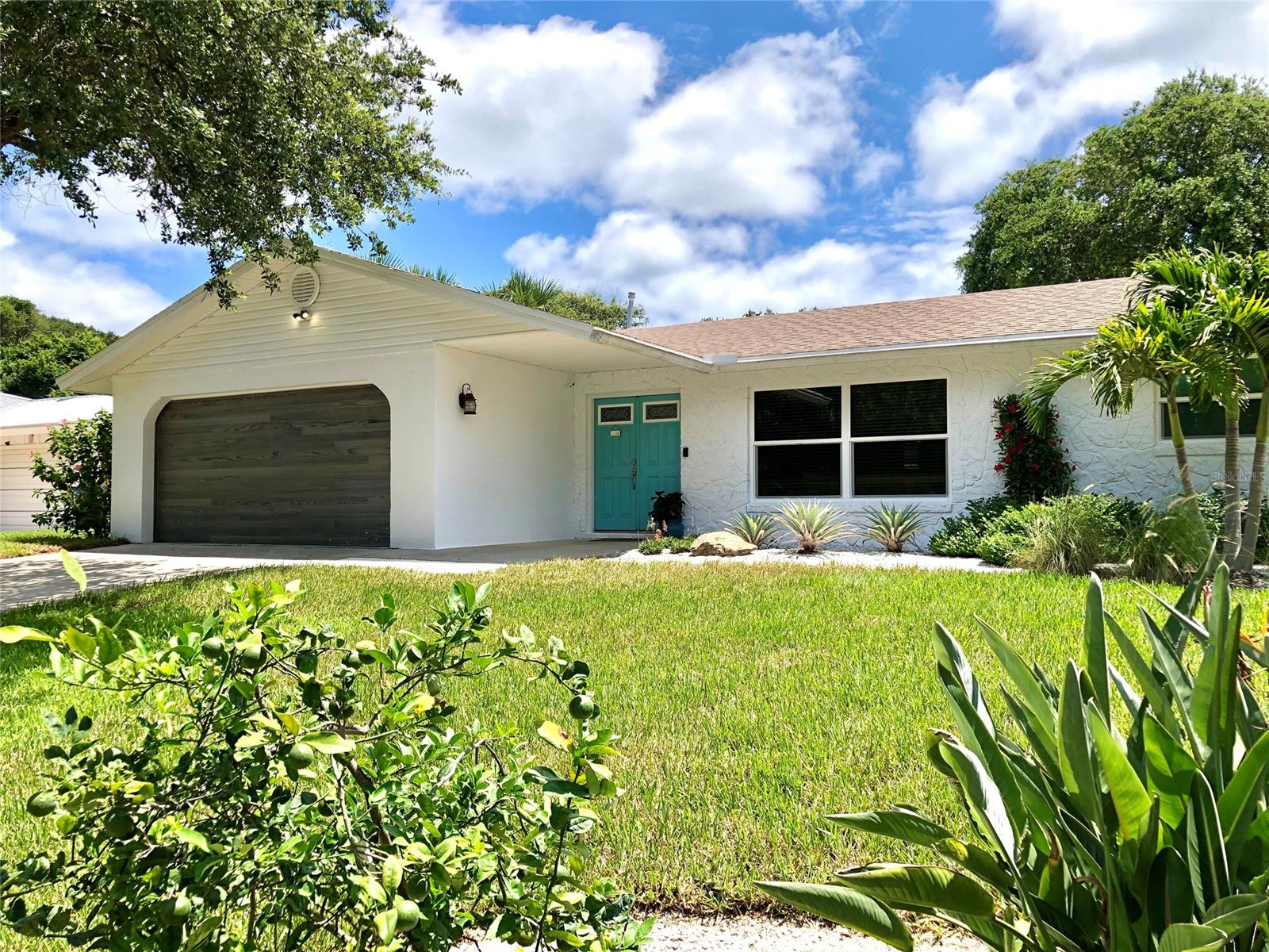 Great beach-side Pool home in the Silver Sands neighborhood of New Smyrna Beach. This charming, 3 bed/2 bath split plan house comes equipped with lots of recent upgrades, including new exterior paint and garage door, a nicely updated kitchen with granite countertops and stainless steel appliances, a brand new AC (2019), a stylishly renovated guest bath and new fans and fixtures throughout. And you can’t beat the location - just a 1/2 mile from the public boat ramp & a short walk to the no-drive beach. Home sits on a (75 x 148) newly sodded, beautifully landscaped lot, this home offers great spaces for entertaining - inside and out. Lounge by the pool, relax in your tropical backyard and stroll to the Atlantic Ocean. Come start your next chapter in this sweet beachside home and enjoy all that New Smyrna Beach has to offer. ;Water: City