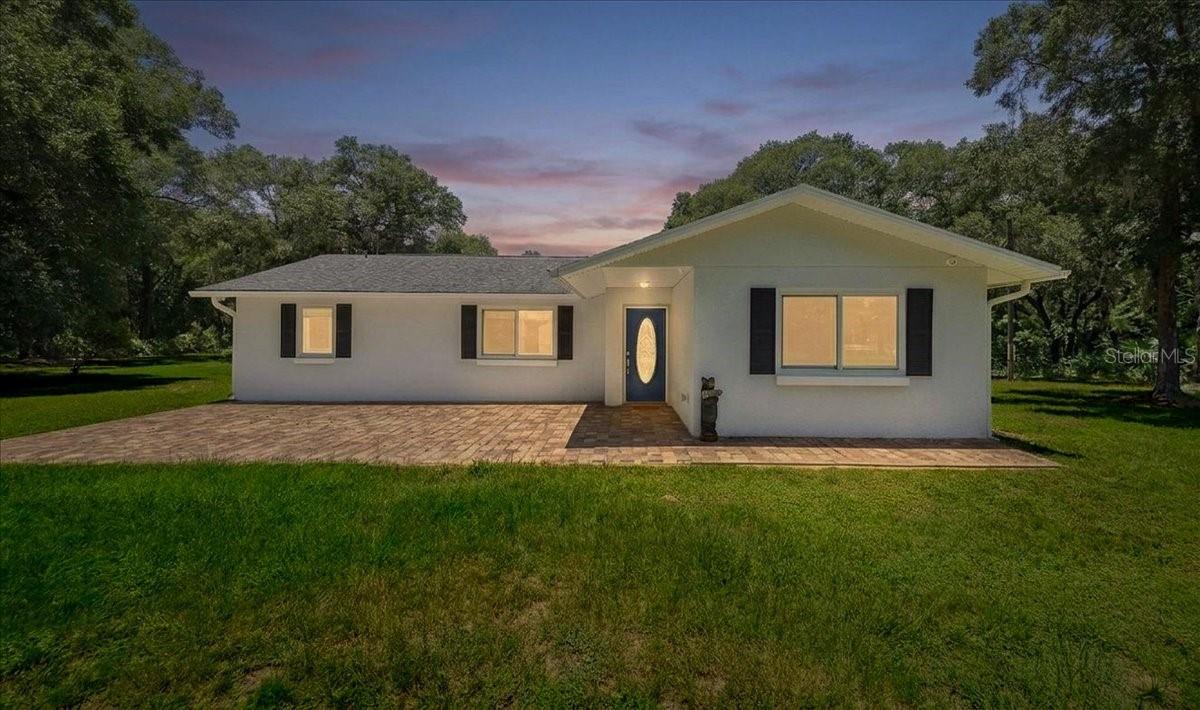 Welcome to your own private country retreat! Situated on 3 fully fenced acres with a gated entrance, this property offers the perfect blend of privacy, functionality, and peaceful Florida living. Whether you're looking for space for animals, hobbies, equipment, or simply room to roam, this property has it all.

The home has been upgraded with new Andersen windows, providing energy efficiency, abundant natural light, and lasting quality throughout. Step outside to enjoy the inviting front paved patio, an ideal spot to relax with your morning coffee or unwind in the evening. At the rear of the home, you'll find two separate patios, one on each side of the sliding glass doors, creating multiple outdoor living spaces perfect for entertaining, grilling, or enjoying the tranquil surroundings.

The property also features a barn, offering endless possibilities for horses, livestock, storage, a workshop, or recreational equipment. With three acres of fenced land, you'll have plenty of room for gardening, RVs, boats, or creating your own mini farm.

Conveniently located while still offering the serenity of country living, this unique property is ready for its next owner to enjoy. If you've been searching for acreage, privacy, and a home with quality upgrades, this is an opportunity you won't want to miss. Schedule your private showing today!