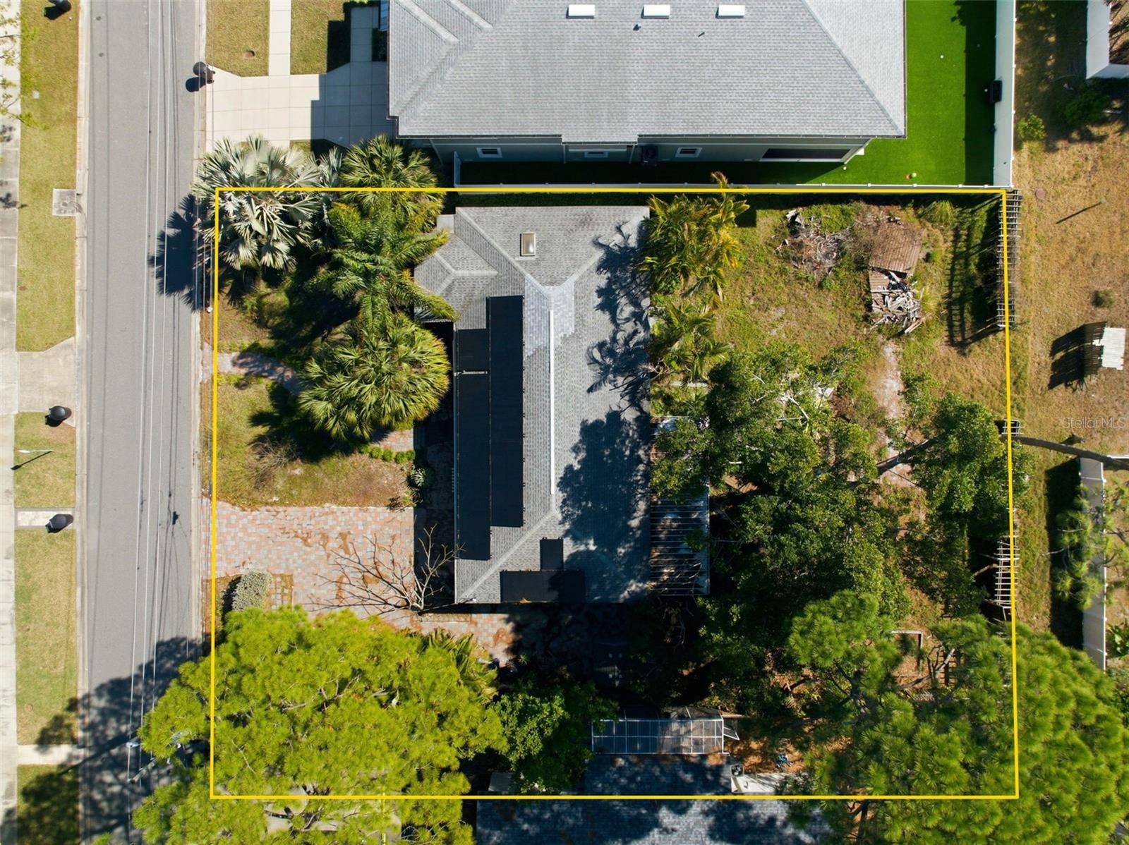 Exceptional redevelopment opportunity in highly desirable Northeast Park. This oversized NT-1 zoned double lot offers rare flexibility, including the potential to subdivide into two buildable parcels (buyer to verify with the City of St. Petersburg). Upon subdivision, each lot may allow construction of a single-family residence with a detached accessory dwelling unit (subject to City approval), creating a unique opportunity for two luxury homes side-by-side — each with multi-generational or guest house flexibility. Builders may benefit from constructing adjacent projects simultaneously, potentially improving efficiency in site work, mobilization, utilities, and scheduling. Located just off 4th Street North and approximately five minutes to Downtown St. Petersburg, the property offers convenient access to Coffee Pot Bayou, Weedon Island Preserve, shopping, dining, major interstates, and area airports. Surrounded by newer million-dollar homes, the neighborhood continues to demonstrate strong resale confidence for quality new construction. Property is located in Flood Zone AE (Base Flood Elevation 8’); new construction elevation requirements should be verified. The existing structure remains on site; however, the highest and best use may be redevelopment.