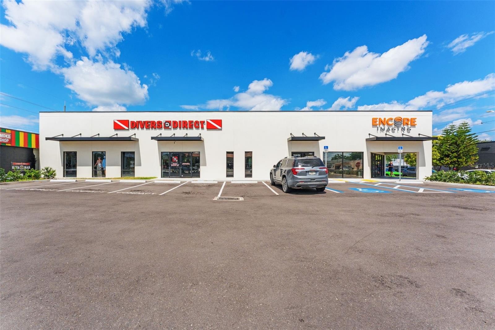 South Cedar Real Estate is pleased to present the sale of a newly repositioned NNN retail asset located at 418 N. Dale Mabry Highway in Tampa, Florida. This property has recently undergone a comprehensive exterior and site transformation, creating a modernized retail investment positioned for long-term performance along one of Tampa’s most heavily traveled corridors, benefiting from traffic counts exceeding 46,000 vehicles per day.
Recent capital improvements include a complete façade renovation, new roof installation, stucco restoration, new awnings, upgraded landscaping, an updated monument sign with LED lighting, and the repaving of both parking lots. Additional site enhancements include the creation of new parking spaces within the right-of-way and the installation of a concrete slab over the existing retention pond, significantly improving the functionality and usability of the property.
The asset is currently occupied by two tenants, Divers Direct and Encore Imaging, both operating under NNN lease structures that provide stable in-place income with minimal landlord responsibilities. The recent renovations and tenant occupancy position the property as a stabilized, low-management investment opportunity within a highly visible and well-trafficked retail corridor.
Strategically located along North Dale Mabry Highway, the property benefits from exceptional accessibility, strong surrounding demographics, and proximity to a dense concentration of retail, dining, and residential development. This offering presents investors with the opportunity to acquire a fully repositioned retail asset in one of Tampa’s most established commercial corridors, with continued long-term upside and durable tenant demand.