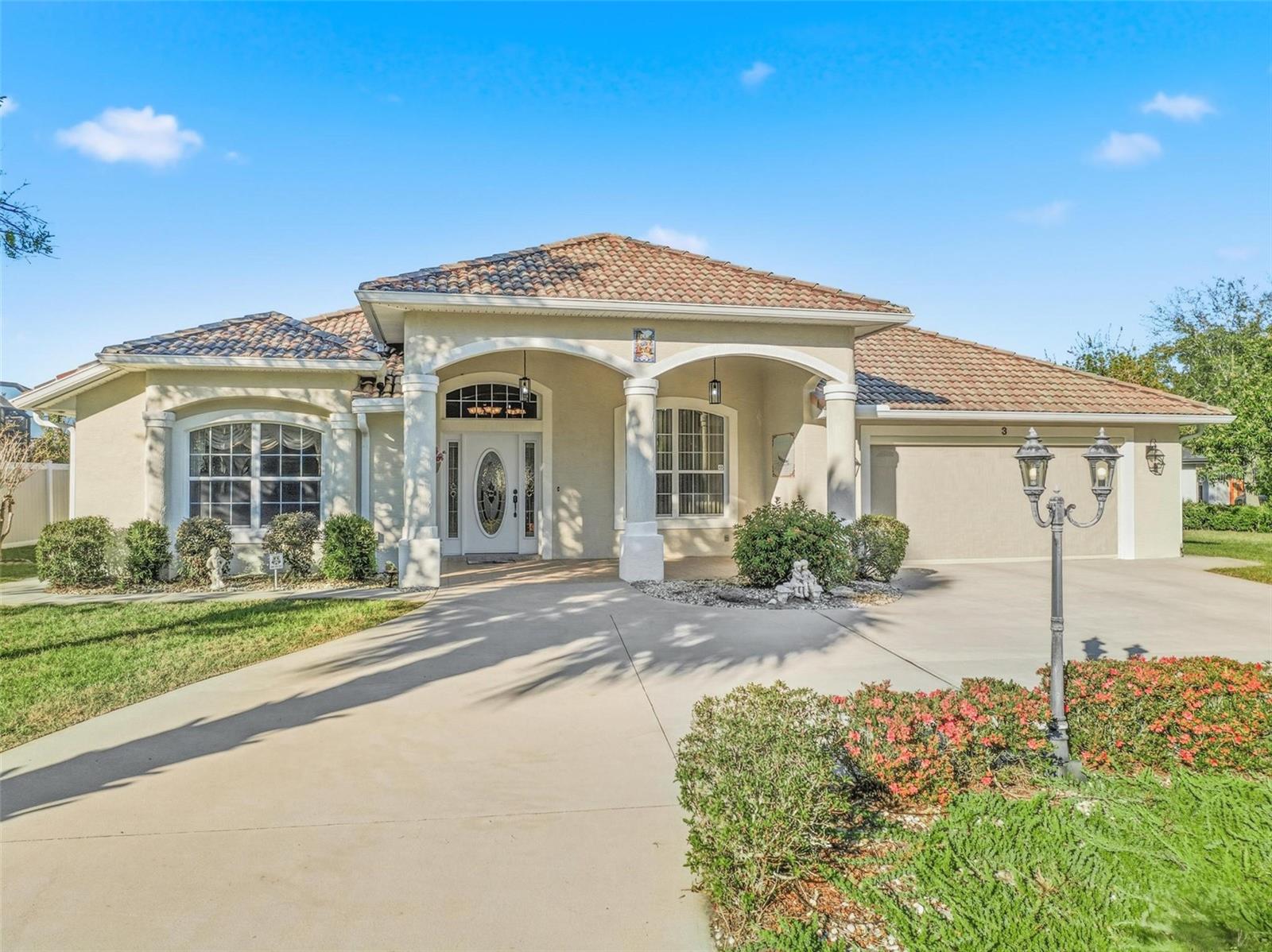 This exquisite custom built 3 bedroom 3 bathroom tile roof Mediterranean style home is nestled in a quite cul-de-sac street in highly sought Palm Harbor area of Palm Coast. When you arrive at the impressive and convenient circular driveway you will surely be impressed the superb curb appeal, elegant front elevation, beautifully manicured landscaping and a grand tiled front porch will invite you to step inside the foyer where you will notice a spacious floor plan, high ceilings, and custom details that add a touch of luxury creating a welcoming ambiance through the home. The split bedrooms offers privacy with the owners suite on and a formal living room/den on one side of the house and the other two bedrooms and bath on the opposite side. The master suite offers a large walk in closet, tray ceiling, en-suite bath with dual sinks, a bidet, a separate walk in shower & whirlpool tub. The kitchen features granite counter tops, stainless appliances, backsplash, plenty of cabinets and counter space and a pantry. Enjoy casual dining either at the kitchen nook or in enclosed lanai summer kitchen equipped with a cook-top, refrigerator and its own bathroom making this a great place for year round enjoyment and entertainment . The backyard covered and screened patio is the perfect setting for out door gatherings or relaxing. Last but not least this home offers an in house laundry room with a sink cabinet, 2 car garage with a side service door, walk-ways around home, gutters, and if storage is very important an air conditioned storage room in the back of the home insures plenty of storage space. AC 2018.   This centrally located home has easy access to shopping, medical, dining, schools, parks and the beautiful Atlantic beaches. Near by walking/ jogging trails. This home is move in ready and waiting for you!