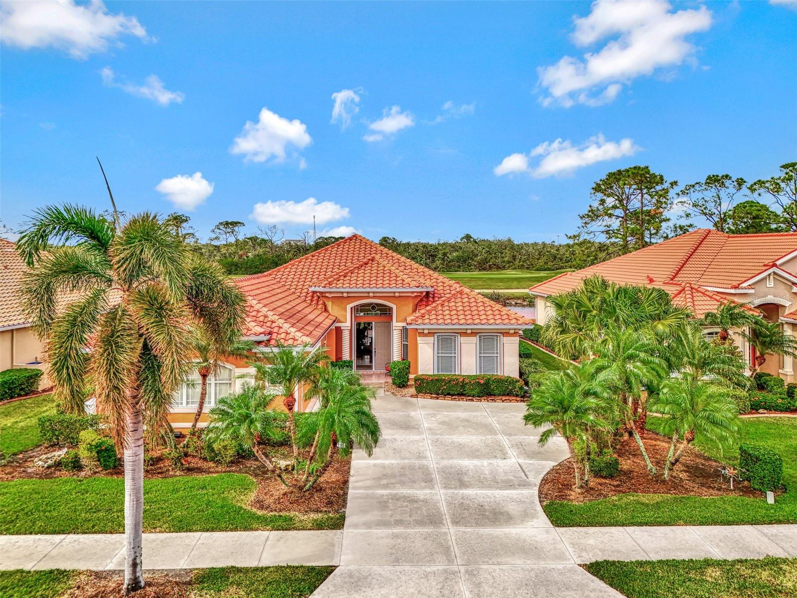 *HERON CREEK GOLF& CC* Lowest Price Per Sq Ft in HC ! HUGE VALUE! This IMMACULATE 3BED + DEN 2579 SQ FT Estate Home is like a breath of fresh air, it is light & bright, neat as a pin and is situated on a homesite w/ Premier WATER & GOLF Views! **NEW TILE ROOF (2023) ** whole house GENERATOR ** FULL HURRICANE PROTECTION**This quality-built Ryland home has a thoughtfully designed floorplan that is well suited to easy living & entertaining alike. It features 3 BEDROOMS, 2 BATHS, a Large DEN that could be converted to a 4TH BEDROOM, a spacious Island kitchen, formal dining room, private primary bedroom with en suite, a central Great room, a fabulous 4 seasons FLORIDA ROOM, extended lanai & side load 2CAR GARAGE. With almost 2600 sqft of living space under air the OPEN CONCEPT design flows seamlessly making entertaining & relaxing effortless! This homes curb appeal is off the charts from the lushly landscaped lot to the new barrel tile roof to the high arched columned entry and a bevy of eye-catching architectural details this home will certainly turn the heads of even the most discerning buyers! Once you walk in through the double entry door it's like a Zen like calm envelopes you....because you feel welcomed, you feel at home! She’s full of good happy vibes and you can tell she’s been loved and meticulously maintained! This home is so light and bright and open, with high tray ceilings painted in watery blue, cool ceramic tile flooring through the main living areas, and crisp classic a neutral paint color that lets the decor set the scene for comfort & serenity. Upon entering the foyer, the den is to the right and makes a great home office or could be a hobby or craft room. There are 2 guest bedrooms w/shared bath that will make visitors feel right at home, there i a dedicated laundry room, a dining room that seats 8-10, an island kitchen w/ a breakfast bar & a sun filled dinette overlooking the lake & golf course! The island kitchen has classic light maple cabinets with pull-outs, 2 pantries, a convenient built in desk, newer appliances, (NATURAL GAS is available at range) and classic solid surface counter tops. The Great Room Opens wide to the gorgeous all seasons FLORIDA ROOM complete with HIGH IMPACT GLASS bringing the outside in. There is a wonderful, screened lanai area off of the Florida room where you can lounge in the sun or spend an eve taking in a majestic sunset! The Primary bedroom also has access to the Florida room. The primary features easy care laminate flooring, tray ceilings, a picturesque stained glass clerestory window & walk-in closet. The en suite features a garden tub, spacious shower, & dual vanities. NOTE: There is ample room on the lot to BUILD THE POOL OF YOUR DREAMS or simply enjoy the Club pool for carefree living! Heron Creek offers exceptional amenities including a 21,000 sq ft club house, 27 holes of Championship golf Arthur Hills design, resort style pool & spa,a robust social activity calendar, fitness center, Tennis courts & formal & casual dining options! Club Membership is required w/3 membership levels offered beginning at $276/month.*NO CDD FEES * LOW HOA FEES iINC: lawn care, trimming, mulching, irrigation, TV and FIBER OPTIC INTERNET & Gated entry, conveniently located w/easy access to I-75 &US-41, the Cocoa Plum Shopping , myakkahatchee trails,WELLEN PARK, Braves Stadium, COSTCO & just minutes to the 507 MILLION dollar Sarasota Memorial Hospital now under construction!