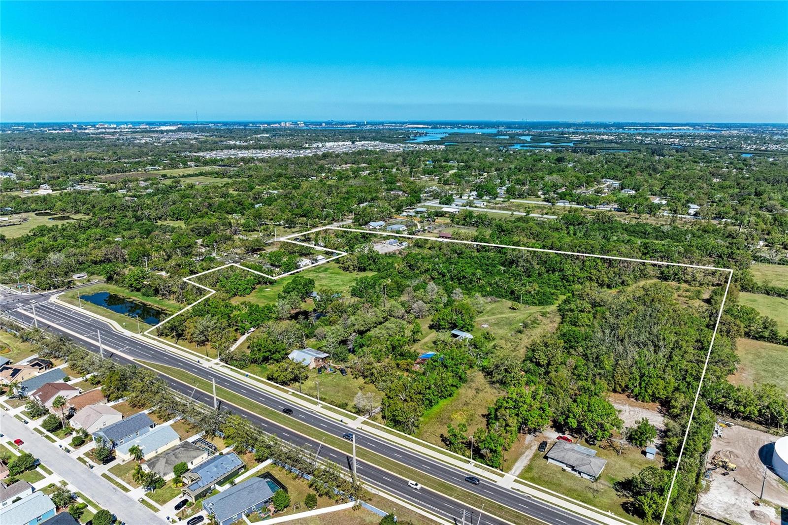 4.5 up to 20 acres on 44th Ave and 45th St. All three properties connect. This would allow for entrance from 45th St and 44 Ave. 44th is a 4 lane throughfare from Cortez to Lakewood Ranch. 4609 44th Ave is 4.5 acres for $1,400,000. 4715 44 Ave is 4.5 acres for $1,400,000. 4007 45th St is 10 acres for $2,000,000.