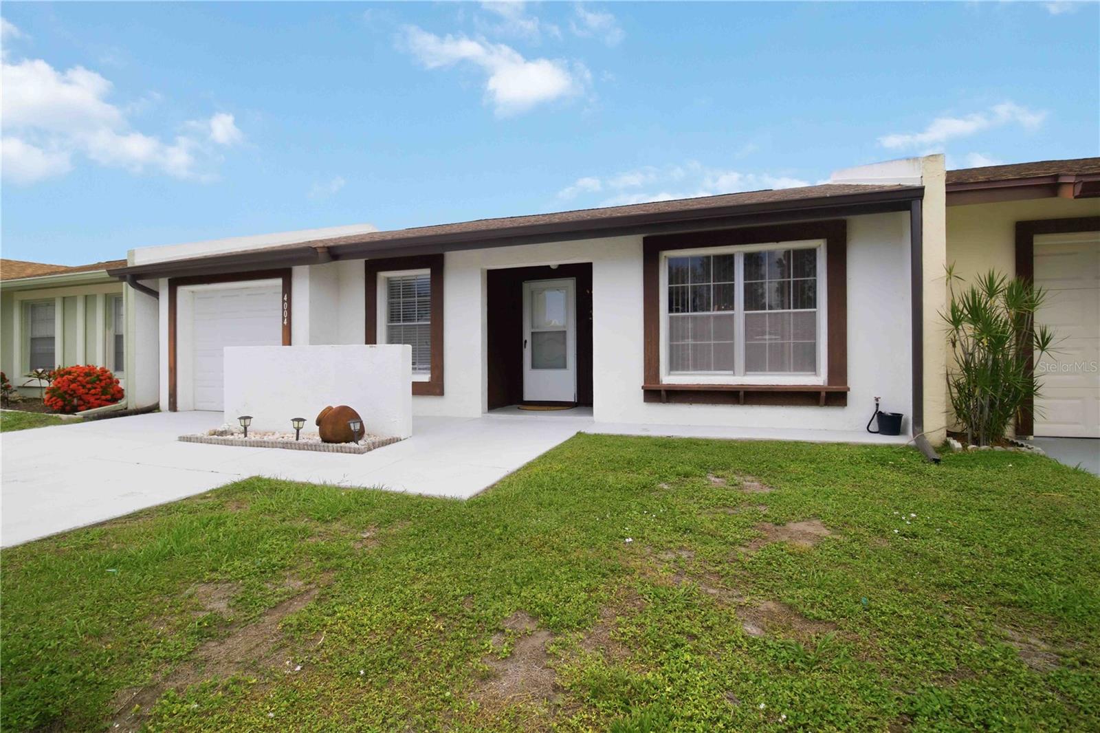 Welcome to Lakeside South! This 2-bedroom, 2-bath villa offers an ideal split-bedroom floor plan, providing privacy and comfort for owners and guests alike. Enjoy peaceful pond views from your living space and relax in a serene setting just minutes from world-famous Anna Maria Island and its pristine Gulf beaches.

The spacious layout includes a 1-car garage, an updated A/C system and appliances that are only one year old, and a location convenient to shopping, dining, medical facilities, and everyday essentials.

Lakeside South residents enjoy an array of amenities including a clubhouse, community pool, tennis and pickleball courts, and a playground. With no minimum lease term restrictions, and an HOA fee of only $169/month (that includes cable/internet and lawn maintenance + the community amenities), this property presents an exceptional opportunity for investors, seasonal residents, or full-time homeowners seeking flexibility and income potential.

Offered at only $200,000, this is one of the best values in the area. Don't miss your chance to own an affordable Florida retreat just 6 miles from the beaches of Anna Maria Island!
