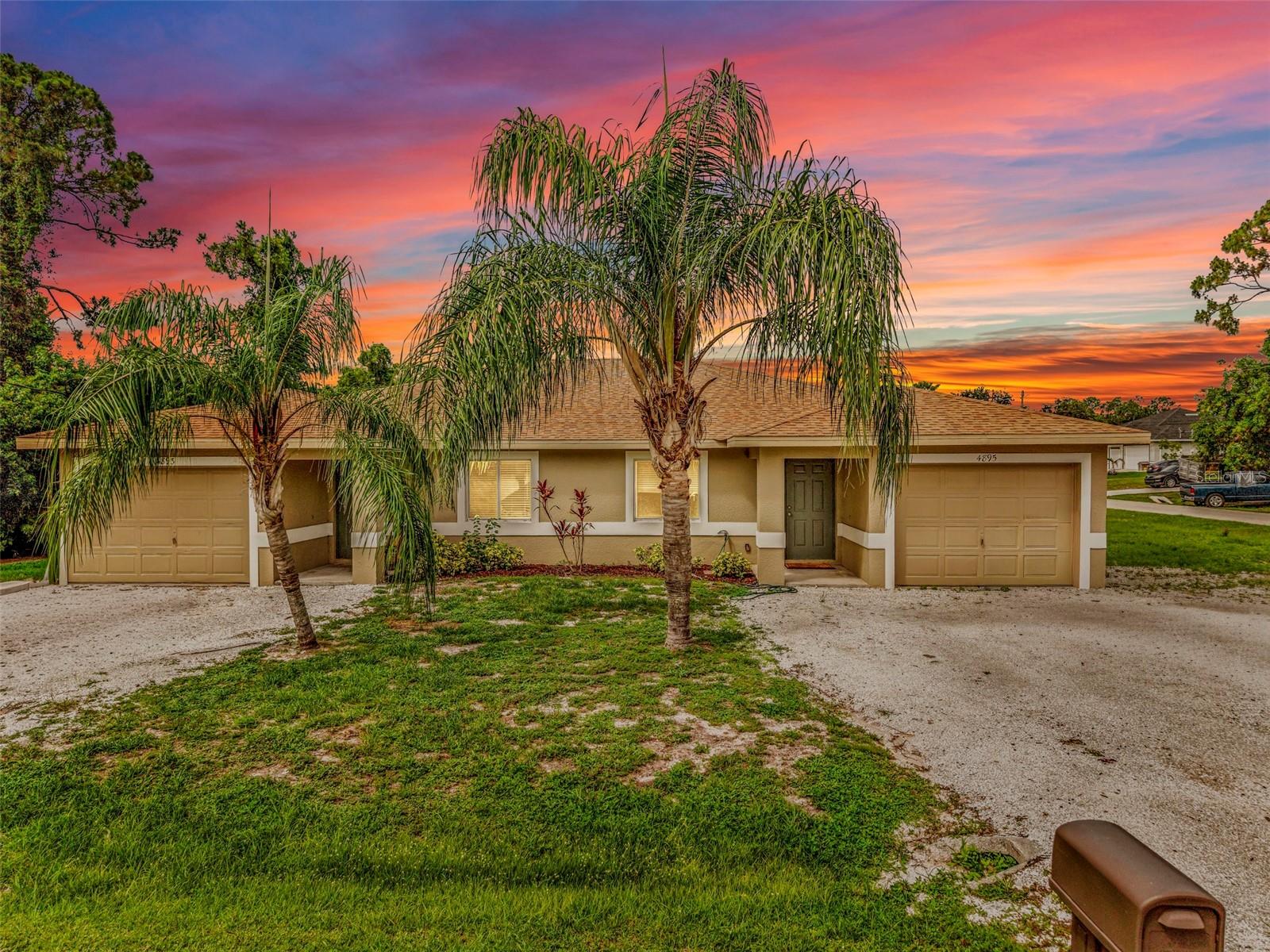 Excellent investment opportunity in the rapidly growing Lehigh Acres market! This well-maintained duplex offers two spacious 3-bedroom, 2-bathroom units, each with a 1-car garage and private entrance, making it highly desirable for long-term tenants. Built in 2005 with solid block construction and located in Flood Zone X with no flood insurance required, this property checks all the boxes for investors seeking stable cash flow and low maintenance ownership.

Each side features over 1,100 square feet of living space with open floorplans, tile flooring in main living areas, central water, septic, and separately functional layouts ideal for maximizing rental appeal. One lease is currently below market at $1,495/month and expires June 30, presenting immediate upside potential for increased income. Estimated market rents support strong future returns and improved cap rate potential.

Situated on an oversized corner lot with ample parking and easy access to SR-82, Fort Myers, shopping, dining, and employment corridors, this duplex is positioned in an area experiencing continued residential growth and rental demand. Whether you're expanding your portfolio, house hacking, or seeking a solid income-producing asset, this property offers excellent long-term investment potential with room for rental growth.