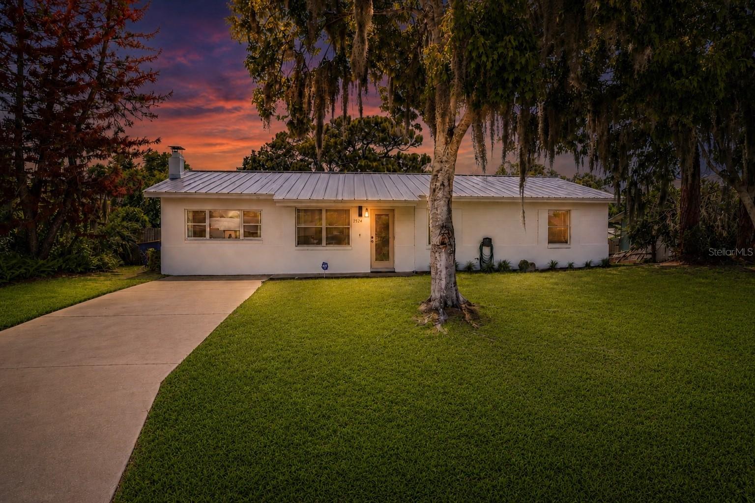 Welcome to your next chapter at 2824 Yule Tree Dr, nestled in the heart of Edgewater and just minutes away from the vibrant culture, dining, and coastal charm of New Smyrna Beach! This inviting property perfectly blends comfort, convenience, and peace of mind, offering an incredible opportunity to enjoy the laid-back Florida lifestyle close to the coast.

Step inside to find a functional layout designed for everyday living. Major peace of mind comes built right in with a metal roof replaced in 2024, a water heater replaced in 2020, and energy-efficient double-pane windows throughout. For added protection and ease, the home features a transferable termite bond, has routine pest control in place, and is fully equipped with an active home security system. Best of all, this property has no flooding, ever—high and dry!

Outside, you will fall in love with the fully fenced-in spacious backyard—a private outdoor haven ideal for weekend gatherings, gardening, unwinding under the sun, or giving pets plenty of room to roam freely.

Conveniently located near local parks, everyday shopping, and the beautiful waters of the East Coast, this delightful Edgewater home is ready for its next owners. Schedule your private tour today and come see all that this property has to offer!