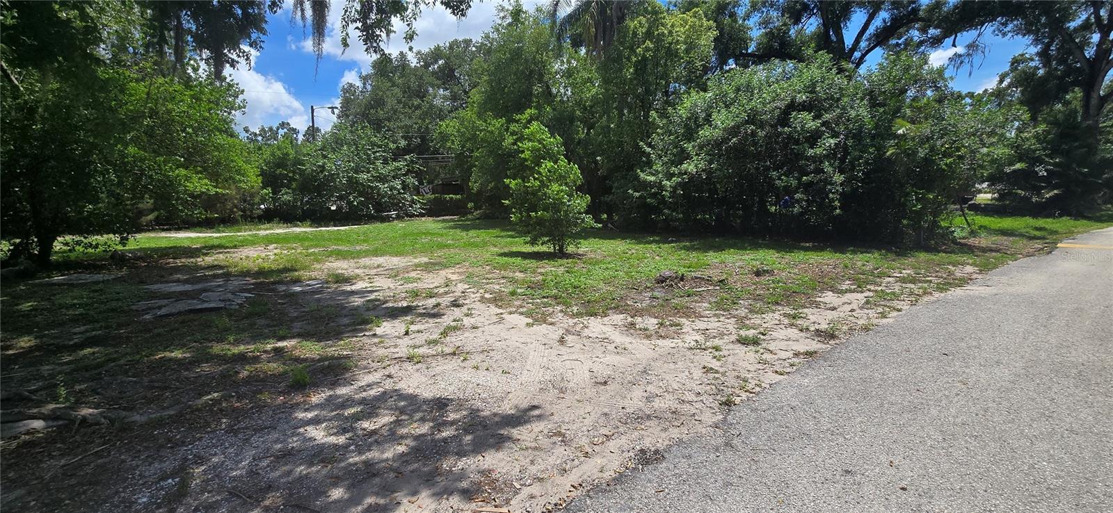 Priced below the competition — don't sleep on this one. Affordable residential lot in unincorporated Hillsborough County, ideally situated between I-75 and US-301 in the heart of the Tampa Bay corridor. This 6,370 sq ft parcel (65' x 98') is zoned AR (Agricultural Residential) and offered as vacant land — a solid opportunity for the investor, builder, or future owner-builder ready to act. No water or electric on site; buyer to verify utility availability and connection requirements with Hillsborough County. Unplatted lot — buyer to perform all due diligence. Comparable lots in the immediate area are listed from $80,000–$150,000. At $58,000, this is one of the most competitively priced residential lots available in the corridor today. East Tampa continues to attract investor attention as a land-constrained submarket within one of Florida's fastest-growing metro areas. Cash or hard money preferred. Sold AS-IS.