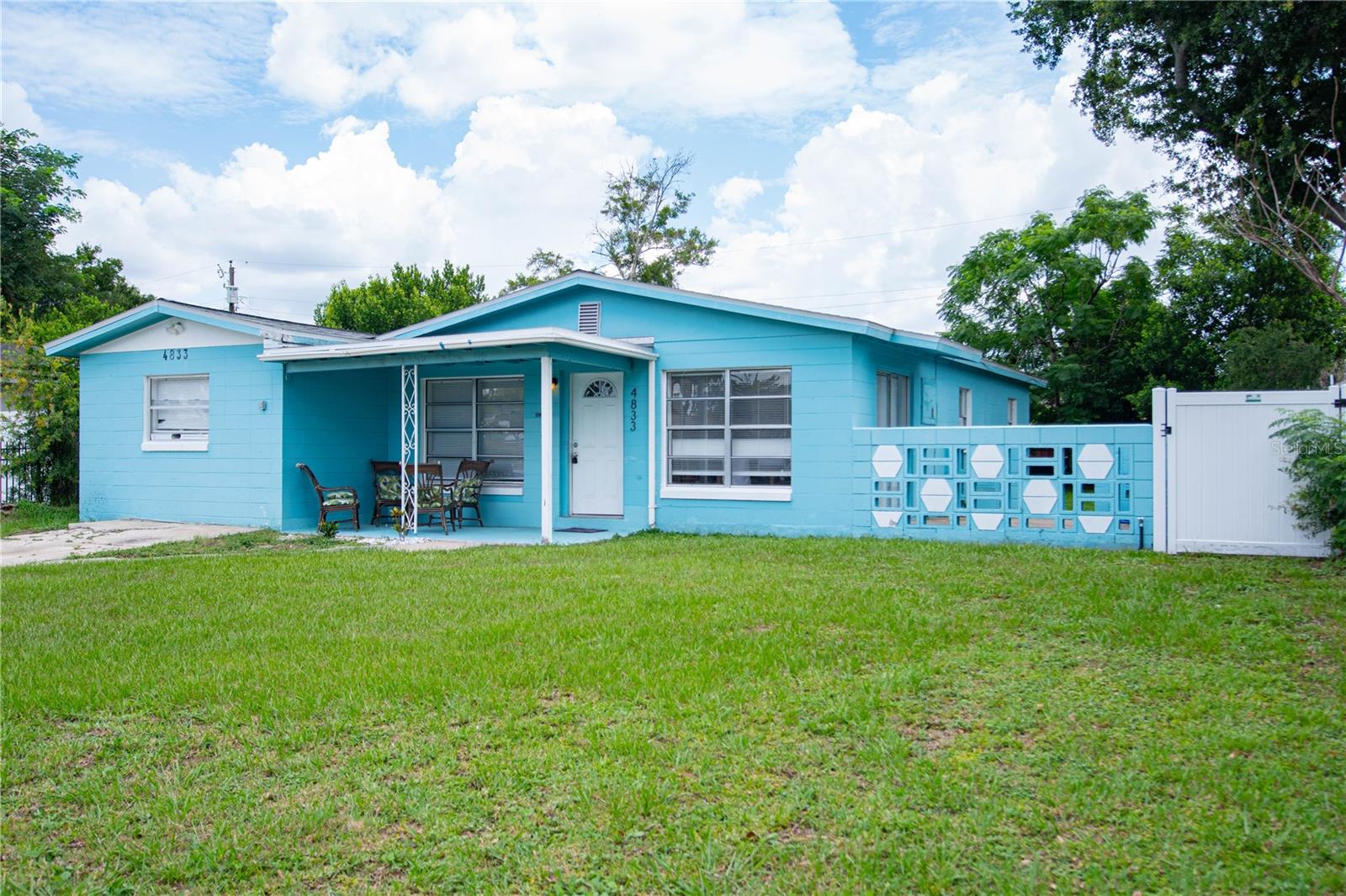 Beautiful fully furnished home located in Tangelo Park, a quiet neighborhood just minutes from Universal Studios and the Florida
Mall. The property features a large, fully fenced yard with a six-foot privacy fence and front gate, offering both
security and plenty of outdoor space.
Enjoy the covered porch, perfect for displaying your plants and creating your own outdoor oasis. Inside, you'll find
a spacious laundry room with shelving to help keep everything organized and make daily living more convenient.
This charming home offers comfort, privacy, and an excellent location close to shopping, dining, entertainment, and
major attractions.