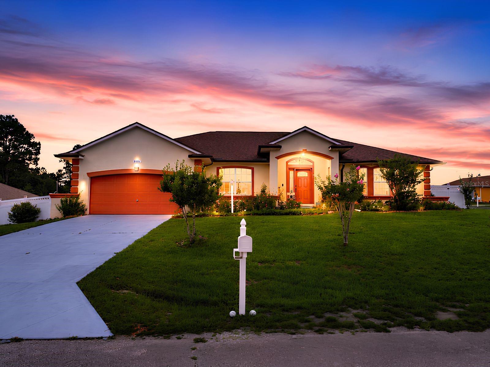 Welcome home to this lovely 3 bedroom, 2 bathroom, 2 car garage home in the Timberwalk area of Marion Oaks in Ocala. The roof was replaced in (2023), adding excellent value and peace of mind to this well cared for property. From the moment you arrive, this home offers a warm and inviting feel with beautiful curb appeal, a spacious layout, and outdoor spaces designed to be enjoyed. Located on a fenced, third of an acre corner lot on a cul de sac, this stunning home offers a wonderful sense of privacy, an 8x10 shed, and a spacious backyard filled with fruit trees and garden favorites including persimmon, figs, avocado, plums, peaches, tomatoes, and melons. Inside, enjoy a bright and open layout with high ceilings, spacious dining and living areas, wood flooring, tile in key areas, and a kitchen featuring rich wood cabinetry, stainless steel appliances, generous counter space, and a breakfast bar overlooking the lovely family room. The primary suite includes a walk-in closet, dual sinks, soaking tub, and separate glass enclosed shower. Additional features include a laundry room with a washtub and storage, whole home surge protector, screened rear lanai, and a true 2 car garage. This beautiful home is conveniently located close to shopping, schools, bike trails, and many great amenities. Do not miss the opportunity to make this inviting home yours, where there is room for the whole family to feel right at home.