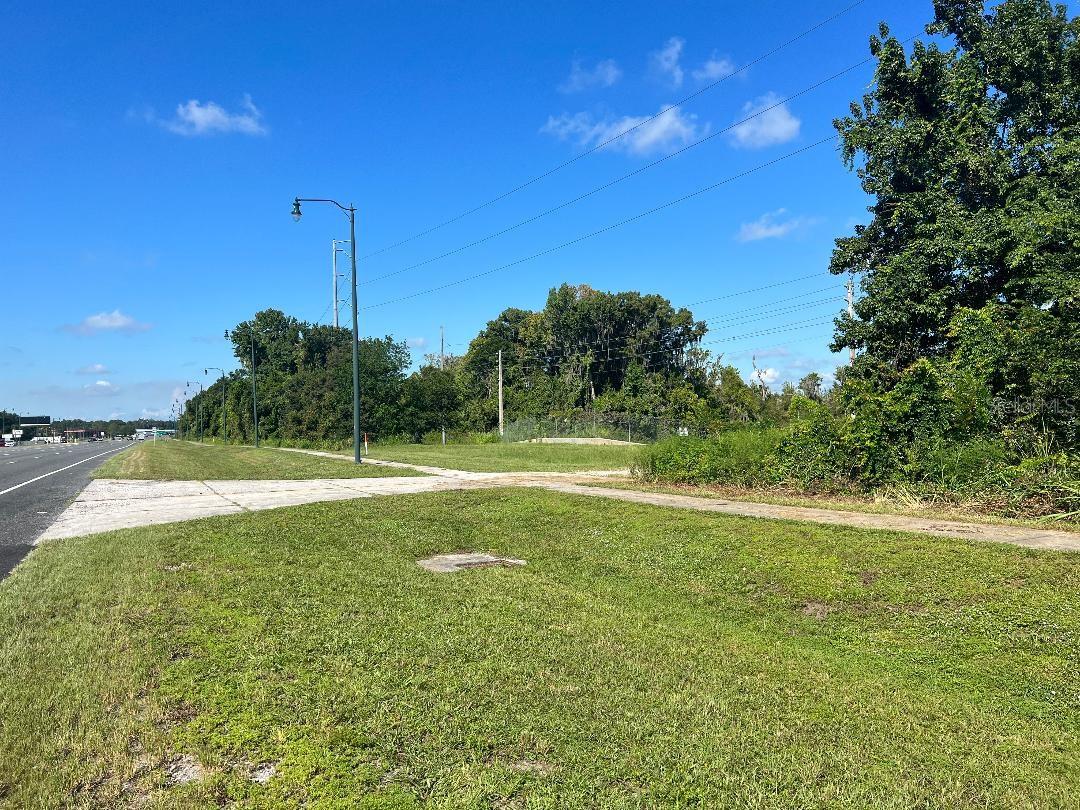 Prime commercial Property with multiple entrances ready for Re-Development.  Ideal for Mobile Home Park or Public Storage.  Buyer must confirm Intended use will be allowed during their Due Diligence period.