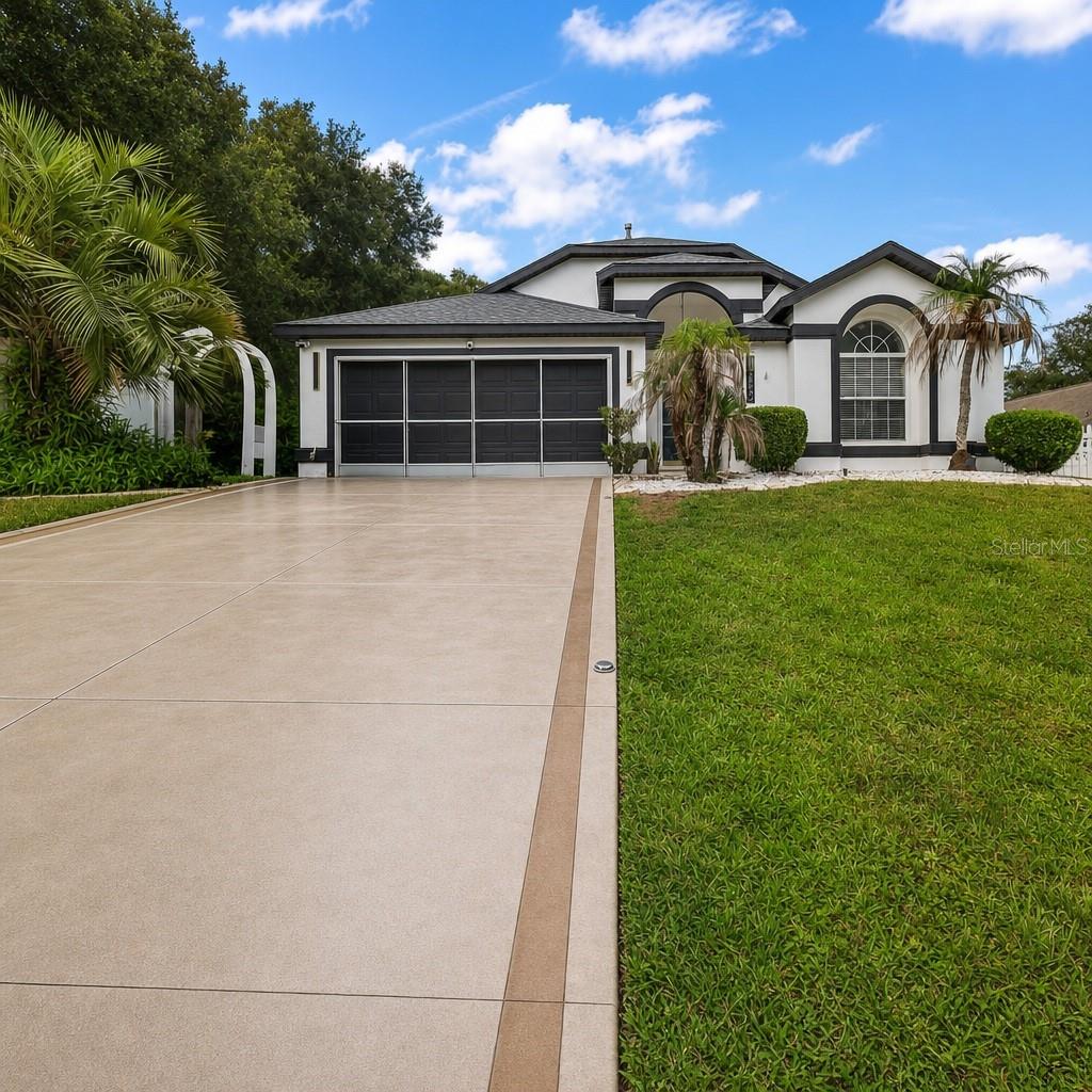 Discover the perfect blend of modern Florida living and upgraded design in this beautifully renovated 3-bedroom, 2-bath POOL HOME in the desirable, low-HOA Chelsea Park community. Thoughtful updates throughout create a fresh, contemporary feel from the moment you step inside.

Brand-new flooring flows seamlessly through the expanded living and dining area, offering comfortable everyday living and effortless space for entertaining. The renovated kitchen is a true showpiece, featuring granite countertops with a waterfall edge, a spacious island, a convenient breakfast bar, modern cabinetry, and stylish finishes that elevate the heart of the home.

The primary suite provides a peaceful retreat with a new walk-in shower, updated ensuite features, and a generous walk-in closet for added comfort and storage. French doors open to your private outdoor haven — a screen-enclosed, solar-heated sparkling pool and a fully fenced backyard with plenty of room to enjoy the Florida sunshine and relaxed poolside lifestyle year-round.

Located just minutes from restaurants, shopping, medical facilities, and everyday conveniences, this modern Florida pool home combines thoughtful upgrades, functional living, and a prime location into one exceptional opportunity.