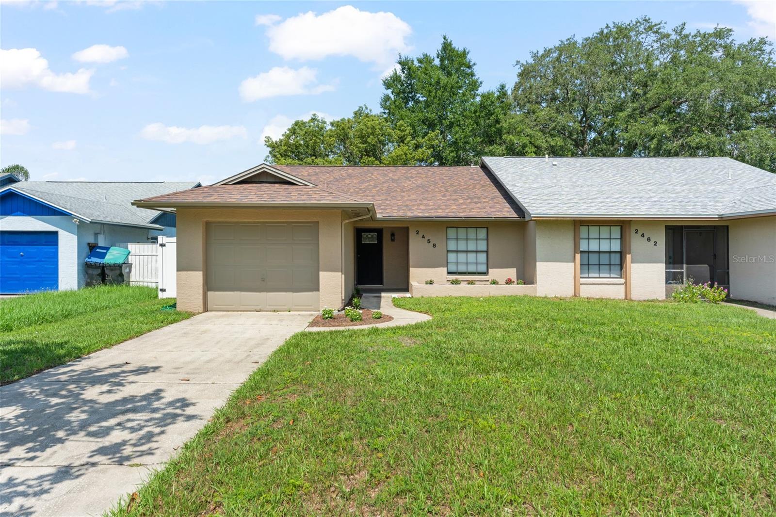 Beautifully UPDATED and truly MOVE-IN READY, this charming 2 BEDROOM, 2 BATHROOM one half duplex with a 1-CAR GARAGE offers a rare opportunity in one of East Orlando's most established neighborhoods, just ten minutes from UCF. 

Thoughtfully maintained and extensively improved, this residence is fully 4-POINT INSPECTION READY with documented capital updates rarely found at this price point. A PREMIUM ROOF (2022), NEW SEPTIC TANK AND DRAINFIELD (2017), INDOOR A/C UNIT (2018), and FULL HOUSE RE-PLUMBING (2011) deliver lasting peace of mind in today's Florida insurance market. The new vinyl privacy fence with gate (2024) create polished curb appeal, while inside, CERAMIC WOOD-LOOKING TILE FLOORING (2024) flows throughout with absolutely no carpet anywhere. Brand new 5" wood baseboards, tastefully updated bathrooms, and stainless appliances (including a NEW DISHWASHER) add a clean, contemporary finish. 

The functional 1-car garage (with a new rod, spring and end plates covered by a 3 YR WARRANTY) conveniently houses the washer and dryer, preserving interior living space. 

Enjoy a remarkably LOW HOA of just $150 per year, top rated Orange County schools including Arbor Ridge, Glenridge Middle, and Winter Park High, and effortless access to SR 408, 417, 436, Highway 50, and University Boulevard. Minutes to Blanchard Park, Waterford Lakes Town Center, Valencia College East, Downtown Orlando, and Orlando International Airport. Schedule your private showing today!