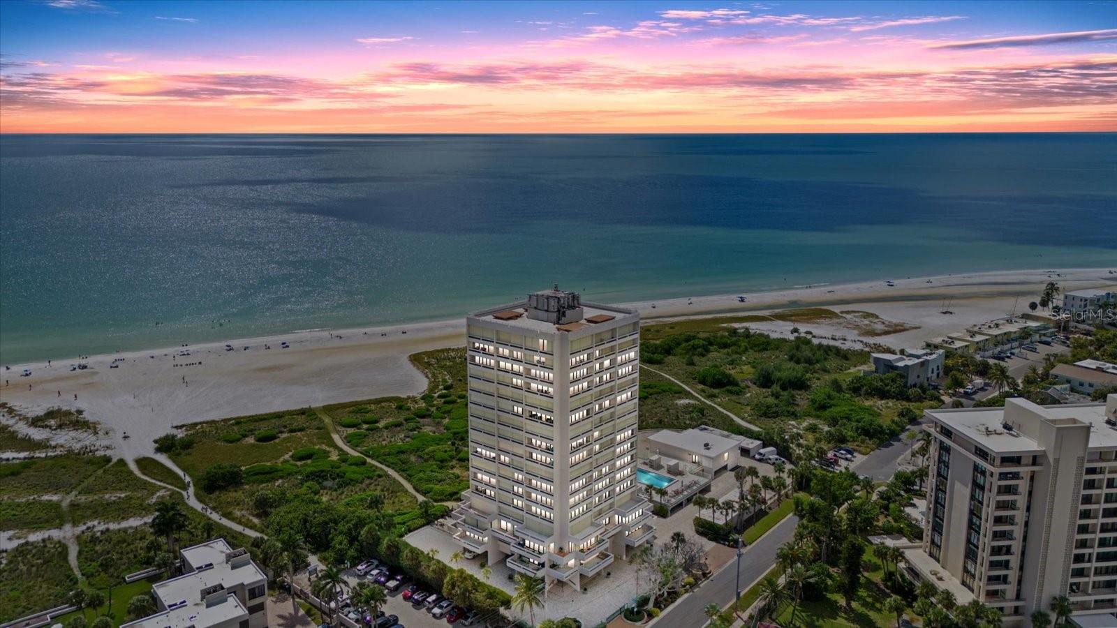 BEACH TERRACE - STUDIO GULF-FRONT RESIDENCE: YOUR PERFECT SIESTA KEY PIED-À-TERRE

Discover your ideal coastal escape at Beach Terrace, perfectly positioned at the end of Siesta Key Village with direct Gulf of Mexico frontage. This charming studio residence offers the perfect pied-à-terre for those seeking an effortless weekend getaway to paradise.

Whether you call Sarasota or Lakewood Ranch home, imagine having your own Siesta Key retreat just moments away, a place to unwind, recharge, and embrace the coastal lifestyle whenever you need it. The private balcony frames stunning Gulf views, while the thoughtfully designed interior maximizes space and comfort.

Covered parking provides convenient, weather-protected access to your beach escape, while the residence's prime location puts you steps from all the dining, shopping, and entertainment that Siesta Key Village has to offer. No need to drive once you arrive, everything is at your fingertips.  

Resort-style amenities elevate the experience: enjoy the elevated heated saltwater pool with its spectacular sunset views (truly the best amenity besides the unbeatable location), stay active in the fitness center, gather in the community room, and access the world-renowned Siesta Key Beach directly from the property. The powdery white sand and crystal-clear waters are quite literally your backyard.

More than a weekend residence, this is your personal gateway to the Gulf-front lifestyle. Whether it's a spontaneous Friday escape or a planned coastal retreat, your Siesta Key sanctuary awaits. This is the effortless beach lifestyle you've been dreaming of, close to home, yet worlds away.