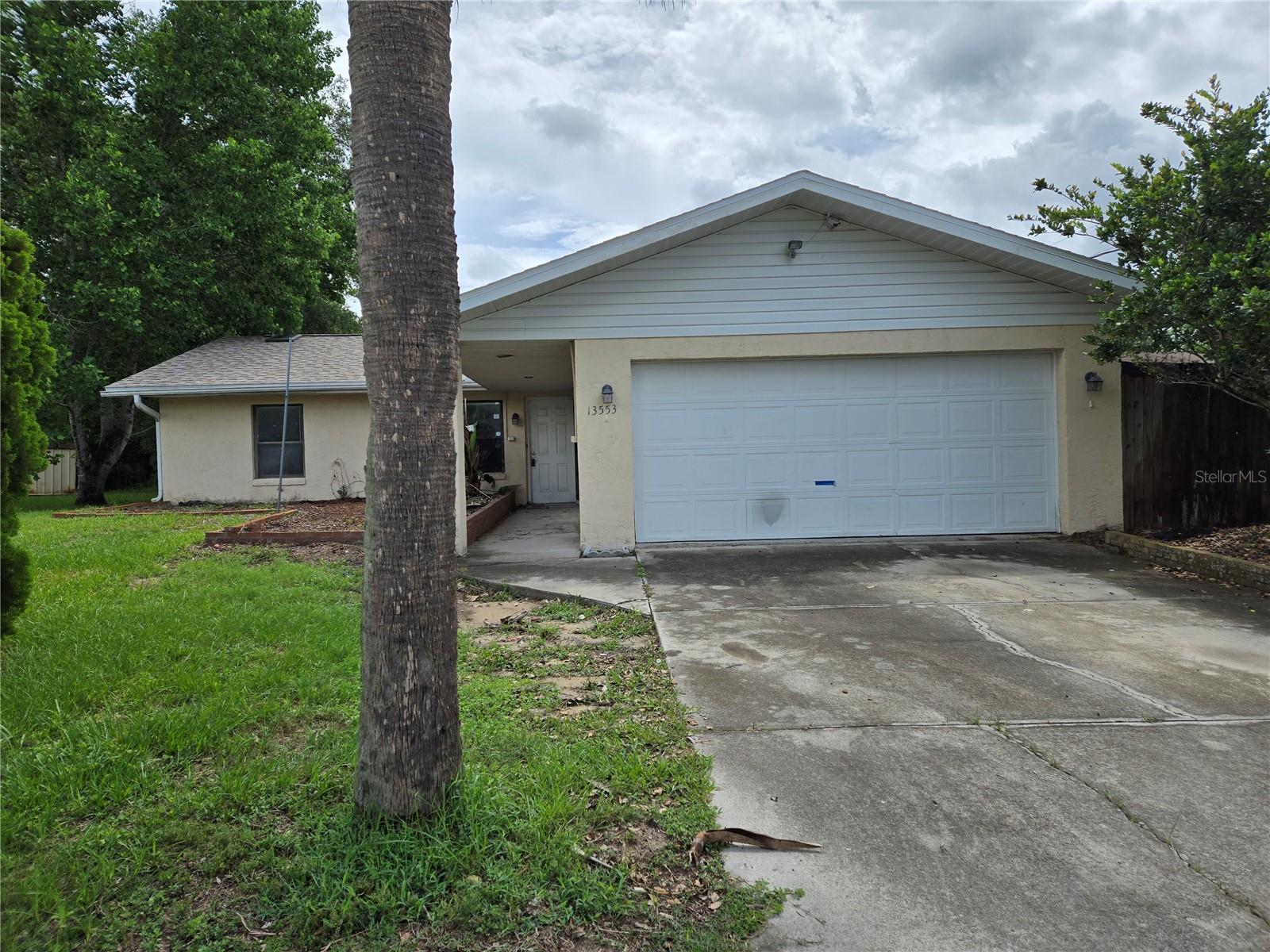 Check out this 3/2/2 situated on a large privacy fenced corner lot with a covered deck.
There is a huge 288sf bonus room on the back of the house 
The split bedroom plan offers oversized rooms including a massive living room  & a large kitchen