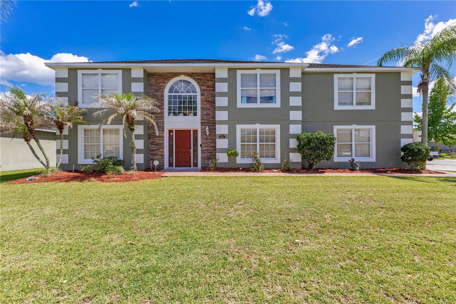 Located in the Southern Pines community of Saint Cloud, this 5-bedroom, 2.5-bathroom home offers a spacious layout, multiple entertainment areas, and a variety of unique features that set it apart from the rest. Situated on a corner lot, the property welcomes you with attractive curb appeal and a beautiful two-story foyer that immediately showcases the home's spacious design.

Inside, the thoughtfully designed floor plan provides plenty of room for everyday living and entertaining. Multiple living and dining spaces offer flexibility for large gatherings, a home office, playroom, or additional lounge areas depending on your needs. The spacious family room serves as the heart of the home, featuring a custom stone accent wall with an electric fireplace that creates a warm and inviting atmosphere.

The updated kitchen is designed for both functionality and style, showcasing rich dark cabinetry, granite countertops, stainless steel appliances, decorative backsplash, abundant storage, and a center island that provides additional prep and workspace. The kitchen flows seamlessly into the main living areas, making it ideal for hosting family and friends.

Also located on the first floor is a dedicated theater room, creating the perfect space for movie nights, sporting events, and entertainment. Whether you're enjoying a family movie marathon or hosting guests, this space offers a true at-home theater experience.

Upstairs, you'll find a spacious loft area that provides additional living space and flexibility for a game room, media room, home office, or study area. The oversized primary suite serves as a private retreat with generous dimensions, abundant natural light, and an ensuite bathroom featuring a soaking tub, walk-in shower, dual vanities, and ample closet space. The remaining bedrooms are well-sized and thoughtfully arranged throughout the second floor, providing comfort and privacy for family members and guests.

One of the standout features of this property is the detached spa room located in the backyard. Designed as a private retreat, this unique space features a spa/hot tub area and plenty of room to relax, entertain, or create your own personal wellness getaway. It adds a level of versatility and luxury rarely found in homes within the community.

Step outside to enjoy the fully fenced backyard with plenty of room for outdoor activities, pets, and gatherings. The detached spa room creates a private escape while still leaving ample yard space for recreation and outdoor enjoyment.

Conveniently located in Saint Cloud with easy access to shopping, dining, schools, major roadways, and everything Central Florida has to offer, this property combines thoughtful design and unique features to create a place you'll be proud to call home.
