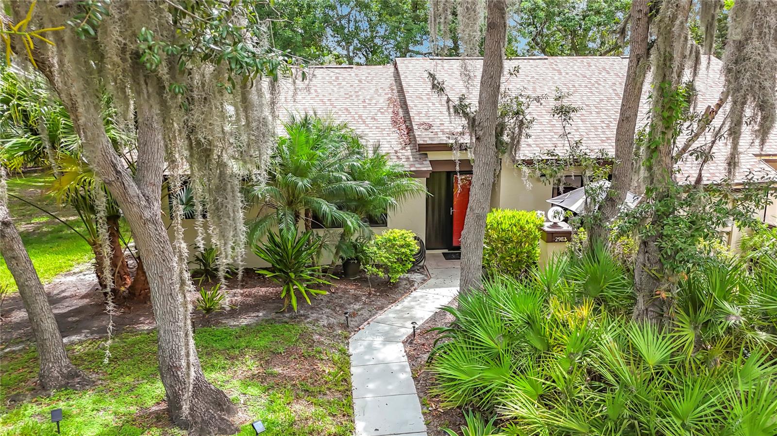 Welcome to this beautifully maintained one-story villa in the highly desirable Strathmore Gate – East community. Situated on a quiet cul-de-sac, this spacious two-bedroom residence offers exceptional privacy with a serene wooded backdrop where deer and other wildlife are often seen.

Inside, the home features a well-kept interior with generous room sizes and a comfortable, functional layout. A screened porch extends the living space and provides the perfect spot for morning coffee or relaxing evenings overlooking the natural setting.

Residents of Strathmore Gate – East enjoy access to a community pool and a multi-use sport court ideal for tennis, pickleball, and volleyball, making it easy to stay active and connected.

A peaceful location, a well-cared-for home, and a community filled with amenities—this villa offers the best of Palm Harbor living.