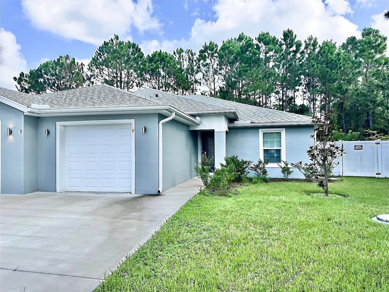Welcome home to this spacious duplex located on a quiet cul-de-sac in the heart of Palm Coast! This well-designed floor plan offers comfortable living with plenty of room to spread out. Enjoy the privacy of a fully fenced backyard, perfect for relaxing and entertaining. Conveniently located near schools, parks, shopping, restaurants, and everyday conveniences, with easy access to major roadways. Don't miss this opportunity to enjoy comfortable living in a desirable Palm Coast location—schedule your showing today!