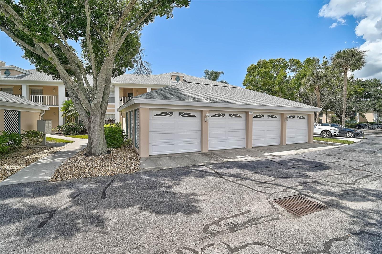 $10,000 Price Improvement! Schedule your showing today! Ground Floor End-Unit Condo in Fairway Trace at Peridia Golf & Country Club! This spacious 2BR/2BA condo with a den and enclosed lanai offers a comfortable layout ideal for full-time or seasonal living. Featuring an open floor plan with a split-bedroom design, the home includes an eat-in kitchen with a pass-through to the dining and family rooms. Recent updates include a NEW refrigerator, NEW microwave, and NEW washer and dryer. The enclosed lanai provides a perfect space to enjoy morning coffee or unwind indoors. A detached one-car garage is included. The interior was freshly painted in September 2025. This unit is conveniently located near the community pool, reserved exclusively for Fairway Trace residents. Residents of Peridia Golf & Country Club enjoy access to an 18-hole executive golf course, tennis courts, pickleball, community pool, live music on Friday nights and Sunday afternoons, and exclusive members-only events. Additional activities include a bowling league, book club, Mahjong, and water aerobics—ideal for those seeking an active and engaging lifestyle. Fees: $4,000 One Time Capital Reserve, $600 Annual Food/beverage Minimum, $938 Quarterly Master Association, $1465 Quarterly to Gulf Coast Property Management.