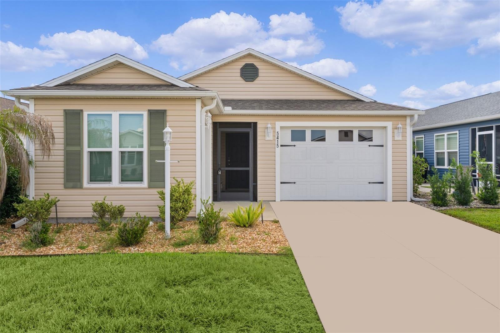 Welcome to this truly unique 2-bedroom, 2-bath patio villa in the highly desirable Village of Marsh Bend. From the moment you arrive, this west-facing Moonstone-3(G) model stands out with features rarely found in patio villa living, including a 1.5-car garage, a separate golf cart garage, and a charming picket-fenced backyard.
Step first onto the screened front porch, a perfect spot to enjoy the fresh air while staying comfortably shaded and protected. A convenient side door leads directly from the porch to the golf cart garage - perfect for those rainy days when you still want to venture out.
Inside, the home opens with the guest bath and indoor washer/dryer closet thoughtfully located just off the entryway. Continue forward, and the villa immediately begins to feel larger than expected, thanks to soaring vaulted ceilings in the main living area. The open layout flows beautifully into the oversized kitchen, one of the true showpieces of this home. White cabinetry, abundant counter space, and a large center island create a bright, welcoming space for cooking, entertaining, or gathering with friends.
The primary suite also features vaulted ceilings, giving the room an airy, spacious feel. The en suite bath offers dual basins, a walk-in shower, linen closet, private water closet, and a walk-in clothing closet. The second bedroom also enjoys vaulted ceilings, making it feel bright and comfortable for guests, a home office, or hobbies.
Out back, the picket-fenced yard is accessible by a second sliding glass door, a rare and wonderful bonus for a patio villa. This charming outdoor space offers both privacy and character. Recent updates within the last year include a freshly painted kitchen, new carpeting throughout, a new Wi-Fi entry door lock, a new Wi-Fi-enabled sprinkler controller, and an all-new HVAC system installed in November 2025.
The Village of Marsh Bend is in one of the most exceptional locations within The Villages. Close to Edna’s on the Green, several recreation centers, including Cattail, Everglades, Water Lily, Riverbend, and DeLuna, community and sports pools, the Water Lily Bridge to Brownwood, and approximately a 20-minute golf cart ride to Eastport, there is always something nearby to enjoy!
Offered turnkey, if desired, this Marsh Bend patio villa combines easy villa living with exceptional storage, a standout kitchen, and rare outdoor space, all in one very special Villages home.