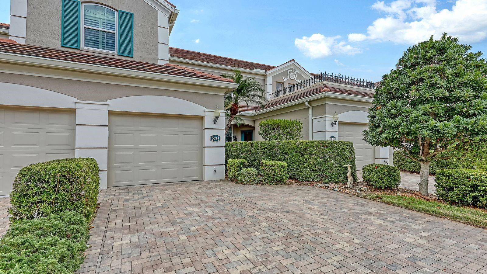 Rarely available ground floor end unit with water views in popular Botanica on Palmer Ranch. Enjoy the ultimate in maintenance free living in this 2 bedroom + den, 2 bath condo with attached 1 car garage. 3 yr. old  AC, wood cabinets, granite counters, stainless appliances. New dishwasher & microwave in kitchen. Private screened lanai overlooking pond with fountain views. All exterior maintenance included. The roofs have been recently replaced.  1621 sq. ft. of living space, directly adjacent to one of the community pools. Included in quarterly fee is cable tv. water & sewer. Private boutique community of 168 residences. Clubhouse features: fitness center, catering room, library, conference room & 2 pools. Located in the heart of Palmer Ranch just minutes from shopping, Legacy Bike Trail & world famous Siesta Key Beach.