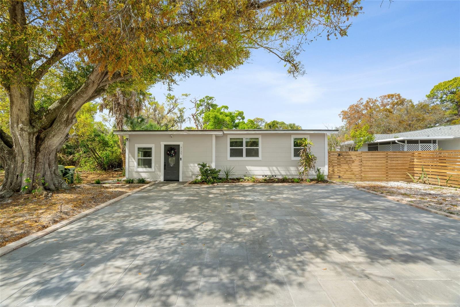 Move-in ready with a bright and modern feel, this Sarasota home features an open layout, large windows for abundant natural light, and a versatile office/family/bonus room. **2022 Roof**Nicely updated bathrooms, SS appliances/solid cabinets/granite countertops in the kitchen and newer flooring as well! The paver driveway offers extra-wide parking with plenty of space for multiple vehicles.

Equipped with a private fenced backyard providing room to create your own outdoor retreat, with space for a pool or garden. Located within the City of Sarasota limits with one-week minimum rentals allowed, this property offers great flexibility for investors, first-time buyers, or those looking to downsize. Just minutes to Downtown Sarasota, SRQ International Airport, dining, shopping, and all the beautiful city of Sarasota has to offer! Reach out to schedule a time to see for yourself today! **THIS PROPERTY QUALIFIES FOR A 1% LENDER INCENTIVE IF USING PREFERRED LENDER. INQUIRE FOR MORE DETAILS.**