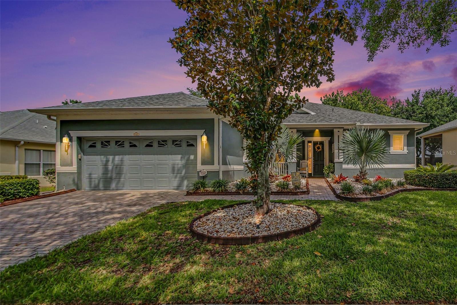 Guard-Gated 55+ Community | No Rear Neighbors | Flex Room | New Roof (2023) | New A/C, Range & Microwave (2024) | New Refrigerator (2022) | Granite Countertops | Stainless Steel Appliances | Plantation Shutters | Screened Lanai | Paver Driveway | Upgraded Landscaping

Welcome to Cascades of Groveland Phase One, nestled within the highly desirable Trilogy community, where resort-style living and everyday comfort come together. This beautifully maintained 2-bedroom, 2-bath home with a versatile flex room combines elegance, functionality, and low-maintenance living.

From the moment you arrive, you’ll appreciate the attractive paver driveway, upgraded landscaping, and inviting curb appeal. Inside, the open-concept floor plan is enhanced by tile flooring, crown molding, plantation shutters, and an abundance of natural light. The flexible bonus room provides endless possibilities as a home office, den, library, hobby room, or guest retreat.

The well-appointed kitchen serves as the heart of the home and features granite countertops, stainless steel appliances, extra-height cabinetry for abundant storage, and a solar tube that fills the space with natural daylight. A second solar tube brightens the laundry room, creating an even more cheerful and functional space.

The spacious primary suite offers a peaceful retreat with an en-suite bath and generous closet space, while the split-bedroom layout provides privacy and comfort for guests. Enjoy relaxing mornings and tranquil evenings from the screened lanai overlooking a private backyard with no rear neighbors.

Major updates provide peace of mind, including a new refrigerator (2022), new roof (2023), and new A/C, range, and microwave (2024).

Residents of Trilogy enjoy an exceptional lifestyle with access to resort-style amenities, including a clubhouse, fitness center, swimming pool, pickleball and tennis courts, walking trails, social clubs, and a full calendar of community activities.

Whether you’re seeking an active lifestyle or a peaceful retreat, this move-in-ready home offers the perfect blend of comfort, convenience, and community. Schedule your private showing today.