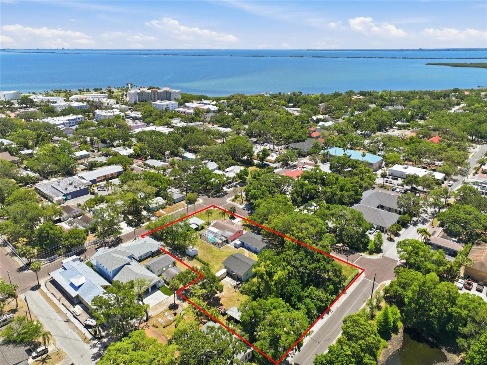 Rare full-block assemblage in the heart of Safety Harbor — Block 24, Lots 6-11, one block north of Main Street, offered as a 5-parcel package (46,100 SF / 1.06 acres). Two livable homes and four redevelopment lots steps from Main Street Dining, Safety Harbor Resort & Spa, Waterfront Park, and Marina. Two homes may be available for seller leaseback during permitting. Property is available as a complete package or individually — seller is open to selling lots in smaller groupings, giving buyers the flexibility to right-size their acquisition. The property can be sold individually or as a package, with other ML#’s, addresses and parcel IDs being noted in the Realtor Only Remarks. Whether targeting one lot, two, or three, this corridor warrants a conversation.
